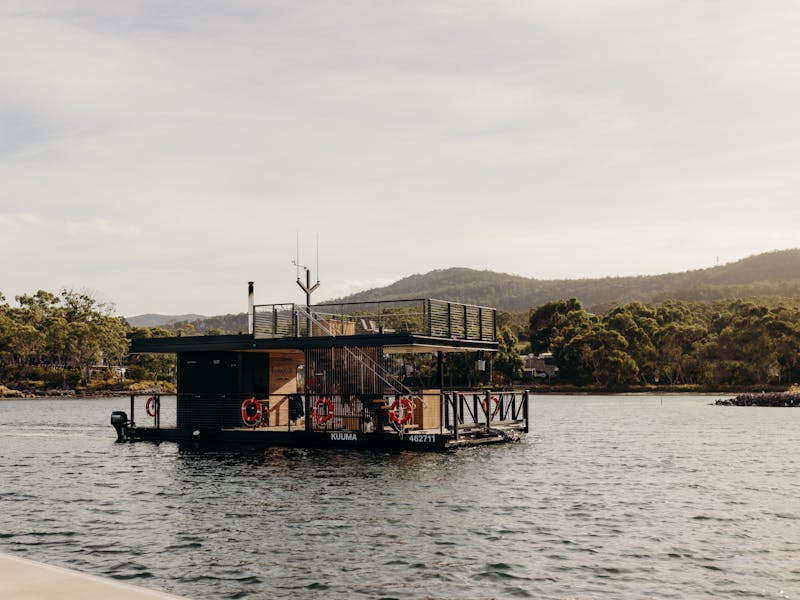 Kuuma Sauna Pontoon Boat cruising in Southern Tasmania