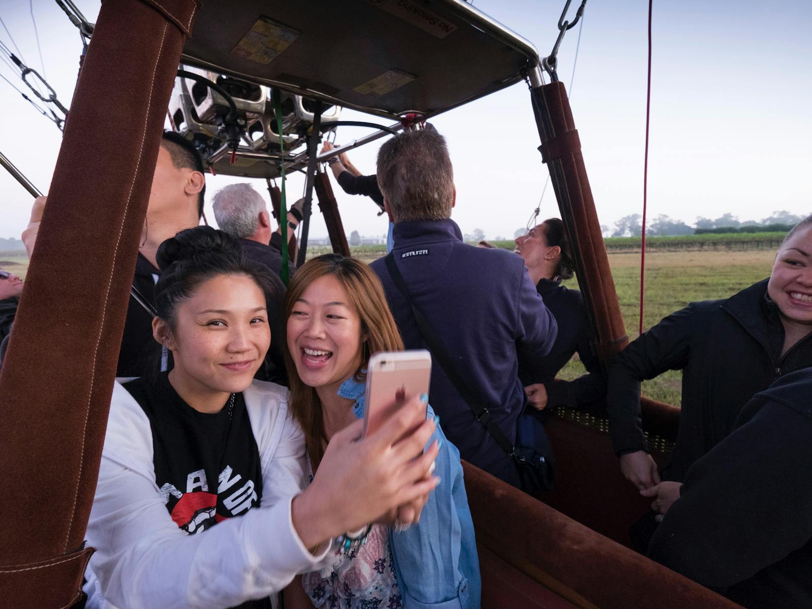 Passengers in balloon basket waiting for launch