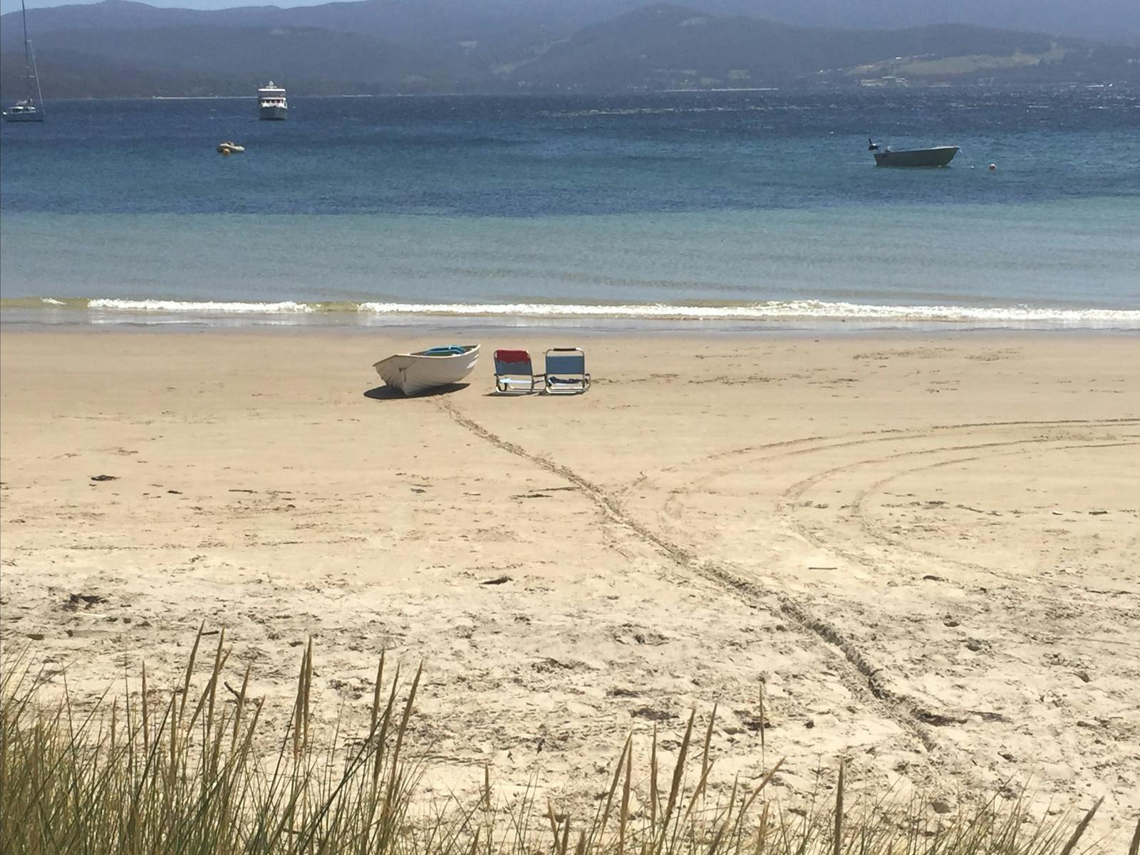 Nebraska Beach with dinghy & beach chairs