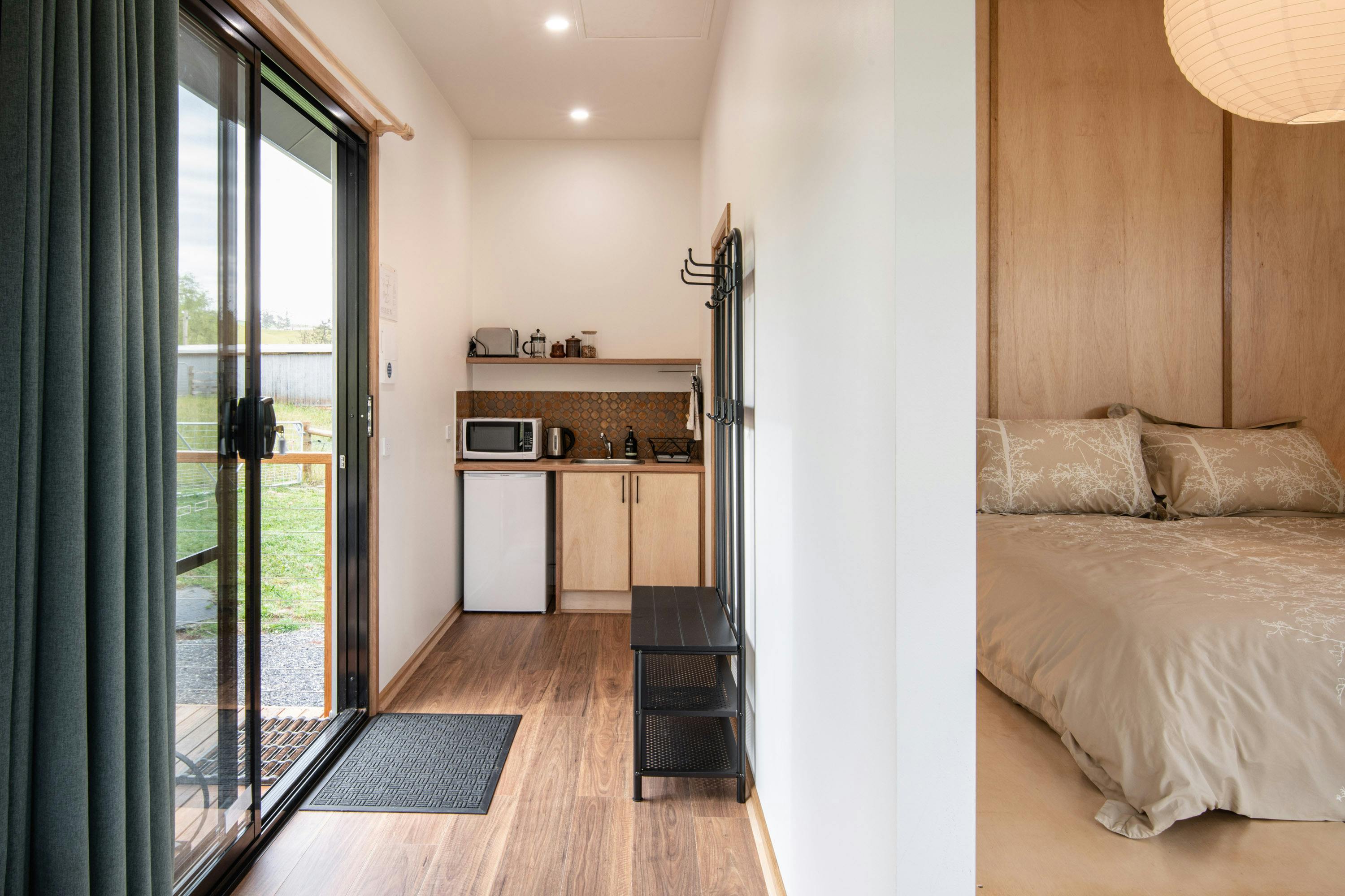 view of entry and kitchenette