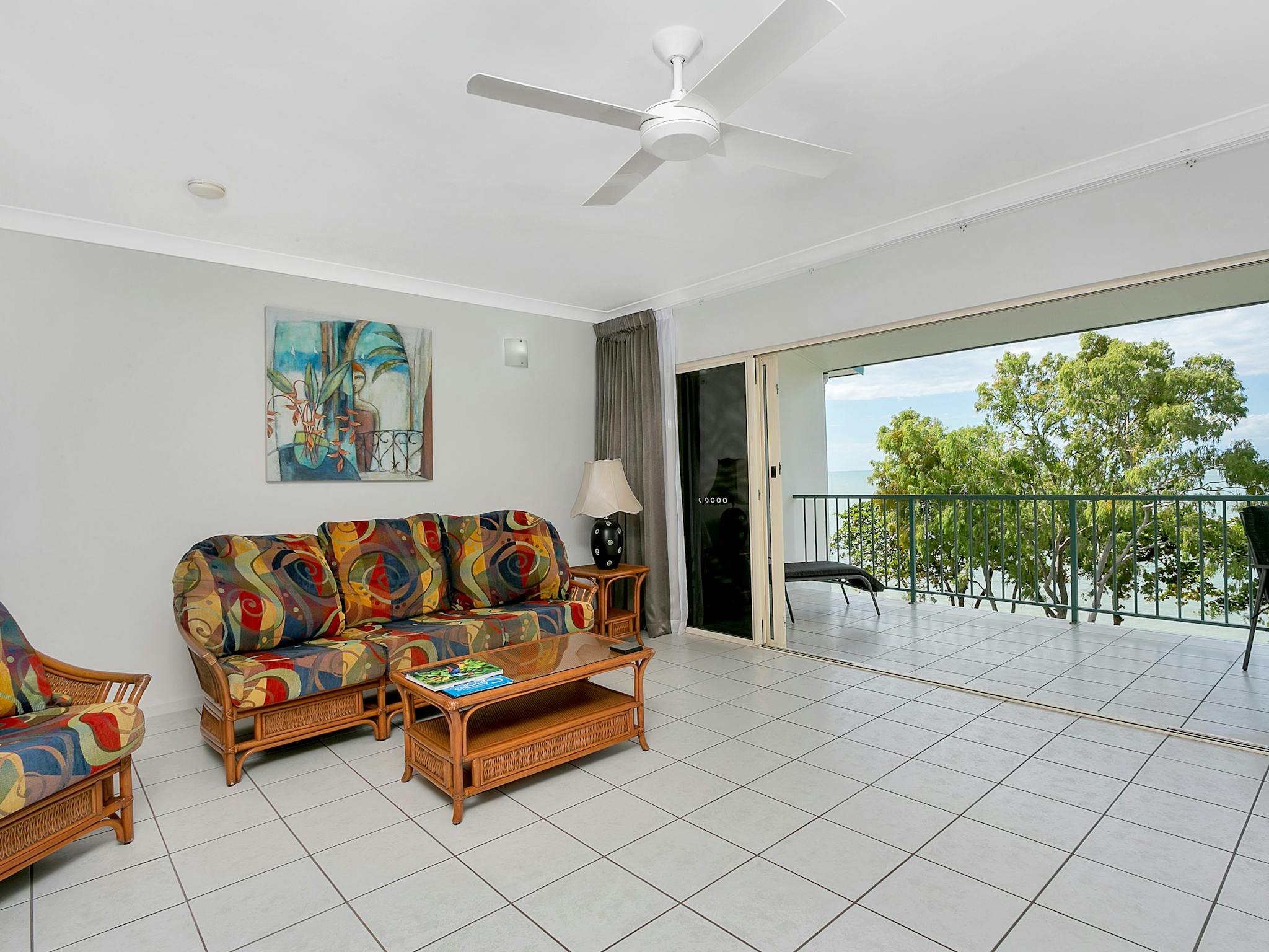 Spacious open plan living opeing to balcony and seabreezes. Spacious open plan living opeing to balcony and seabreezes.