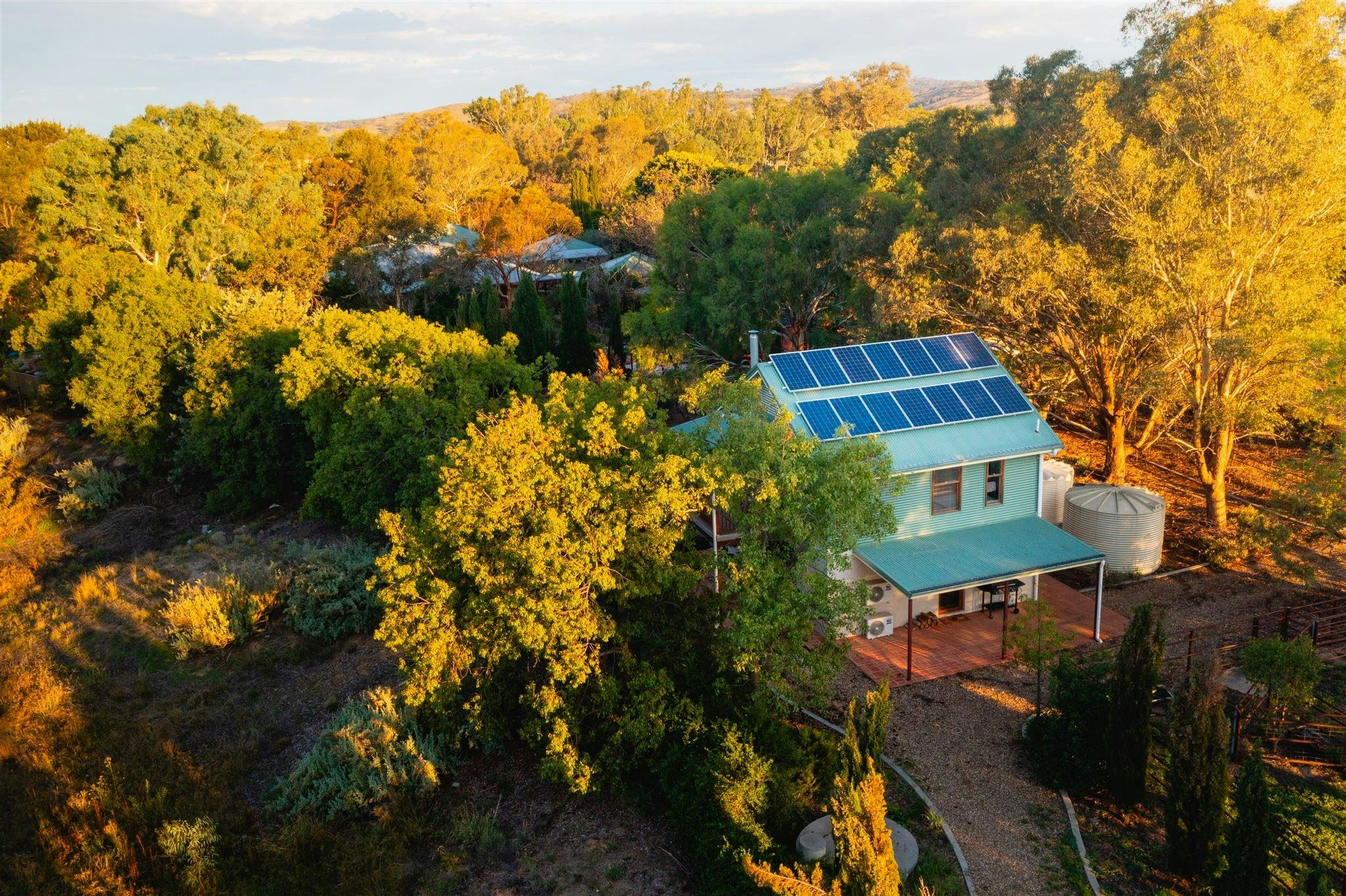 Overhead view of guesthouse, trees
