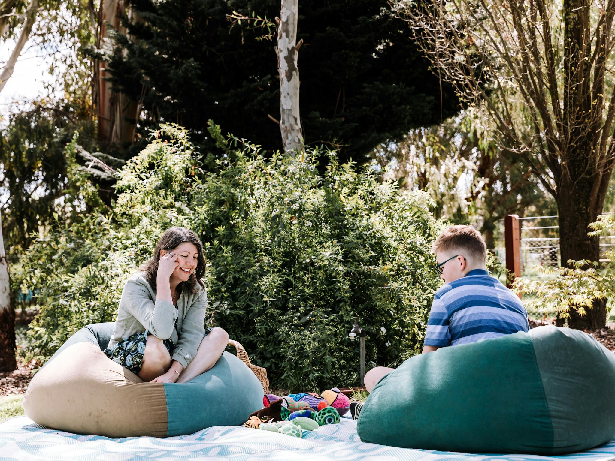 Young person therapy outdoors in bean bags