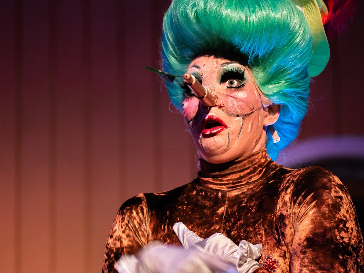 Drag queen dressed as a marionette puppet
