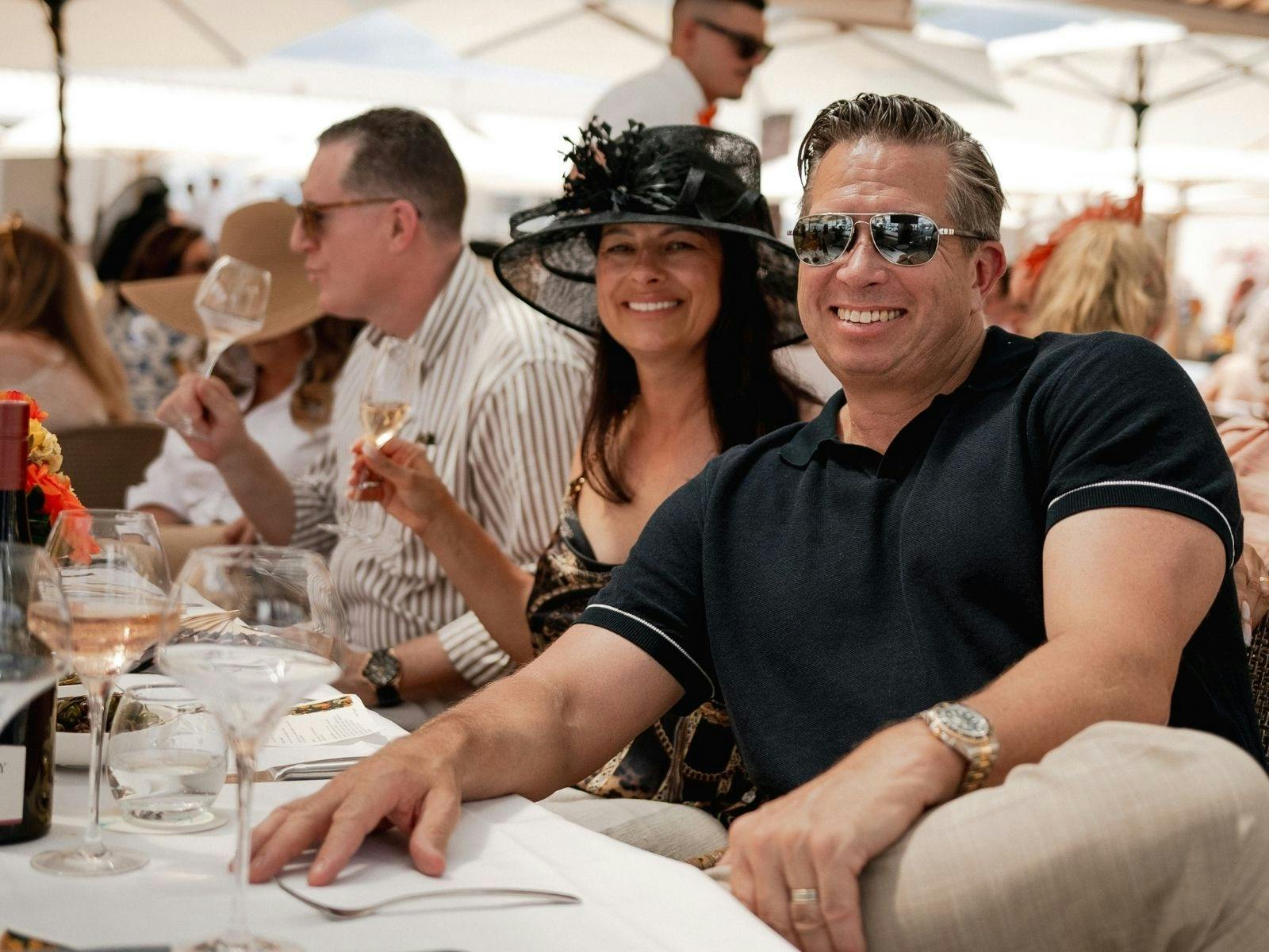A lovely Gold Coast couple enjoying a deluxe beverage package at lunch during Melbourne Cup