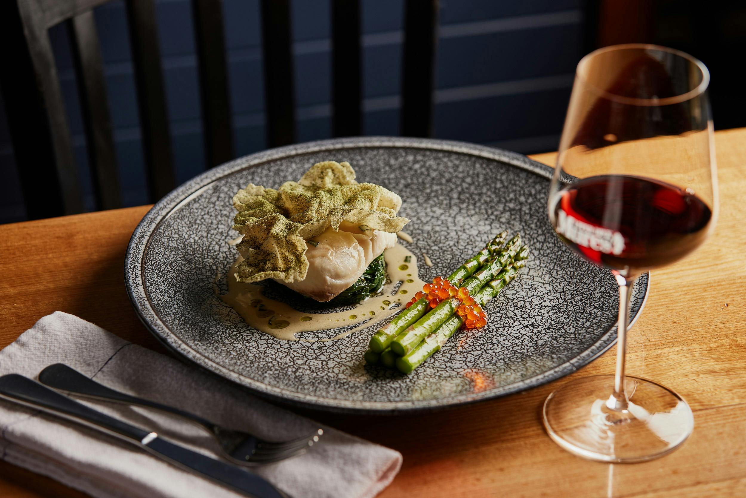 Mures signature dish, Blue Eye Trevalla fish served with asparagus, caviar and tarragon sauce.