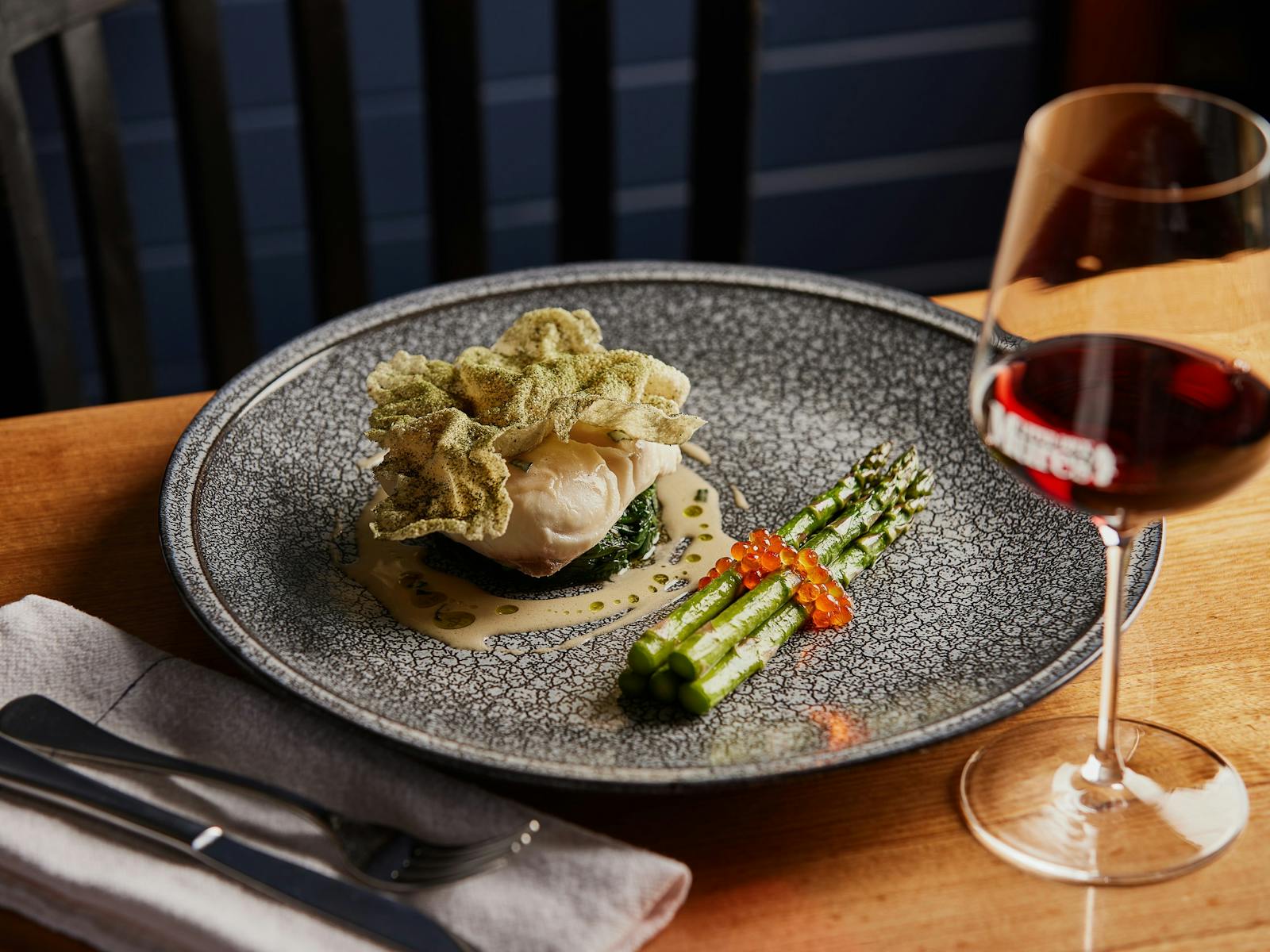 Mures signature dish, Blue Eye Trevalla fish served with asparagus, caviar and tarragon sauce.