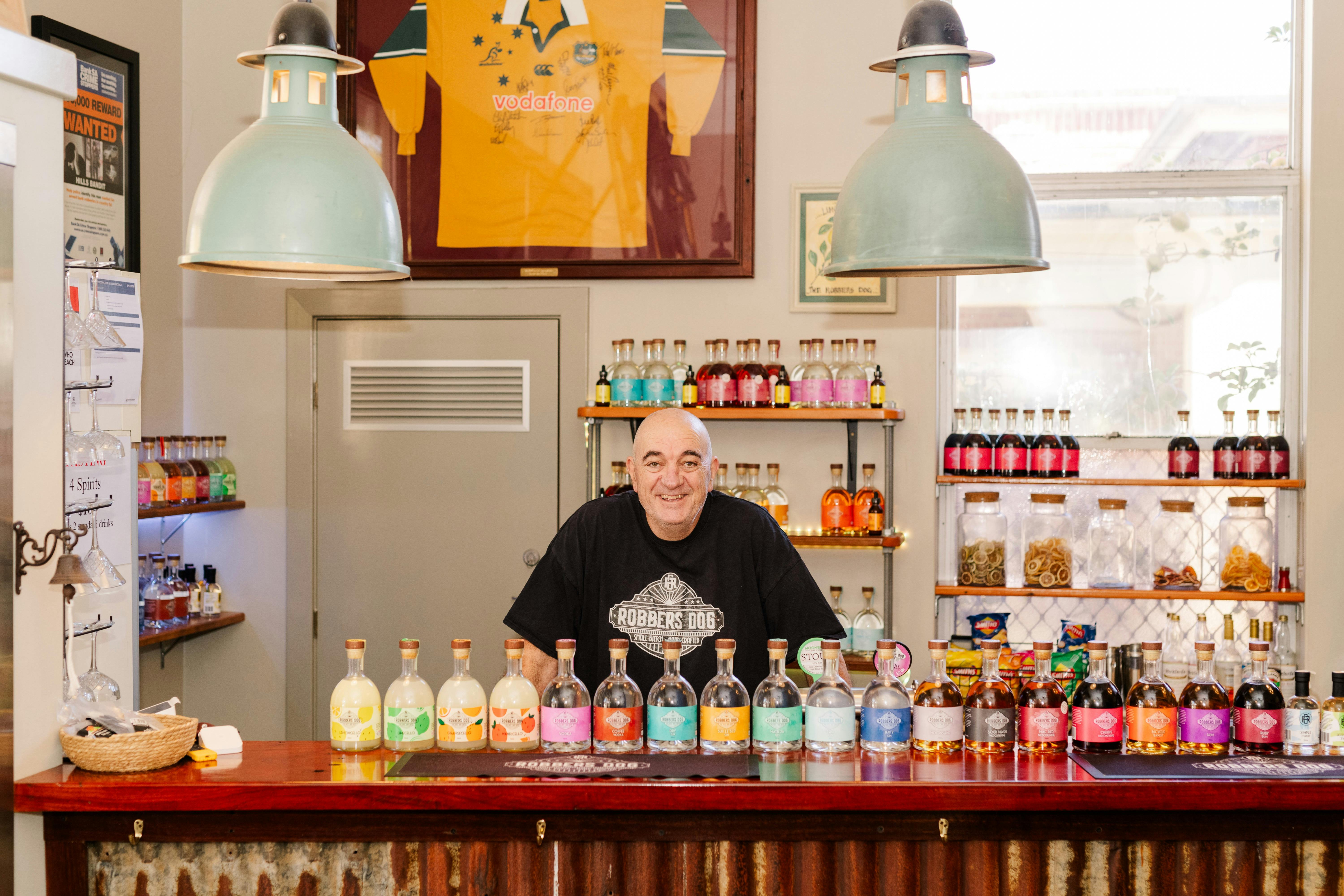 Head Distillery Rob proudly displaying Robbers Dog extensive range