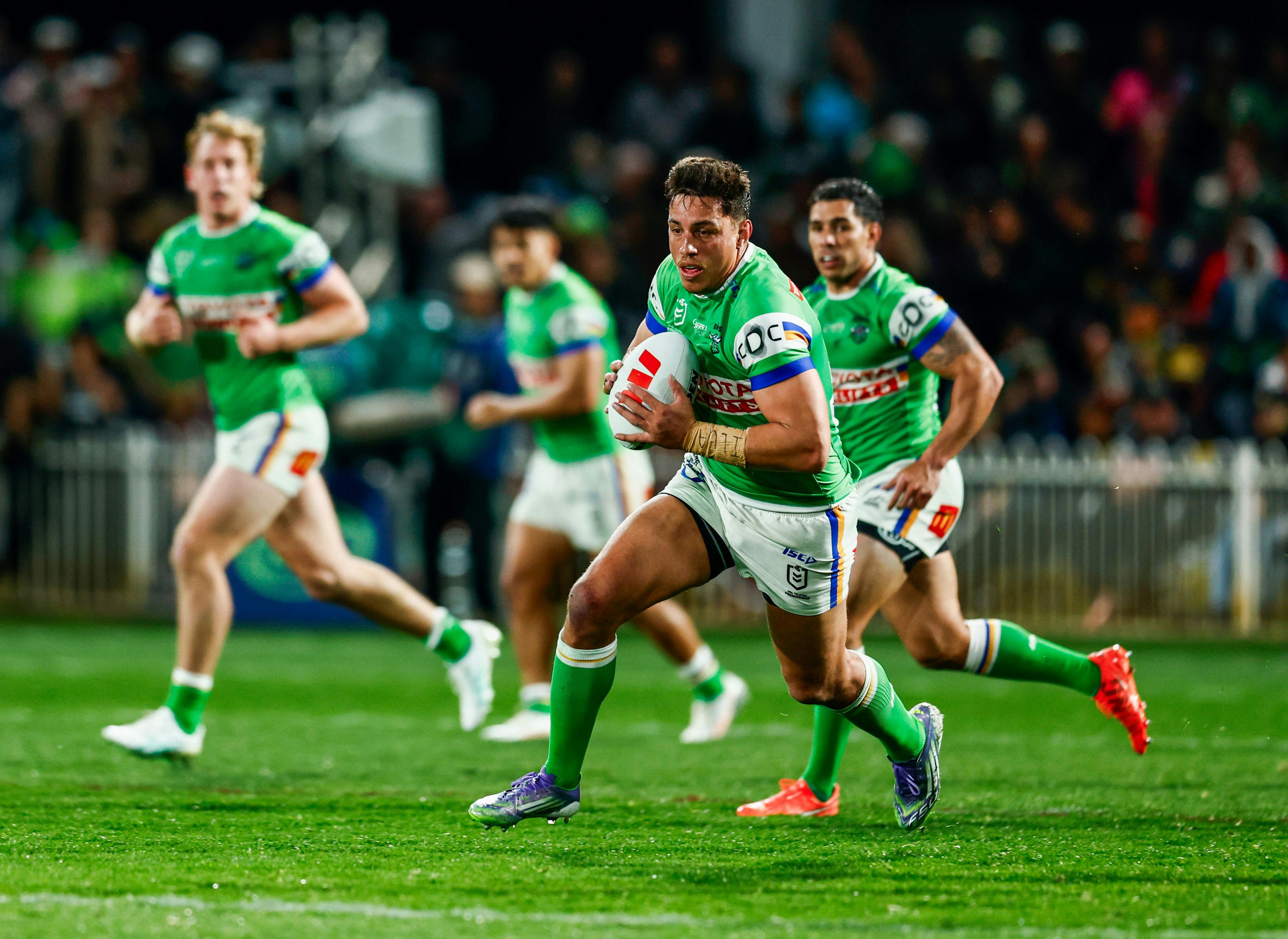 Canberra Raiders player Joseph Tapine running the ball.