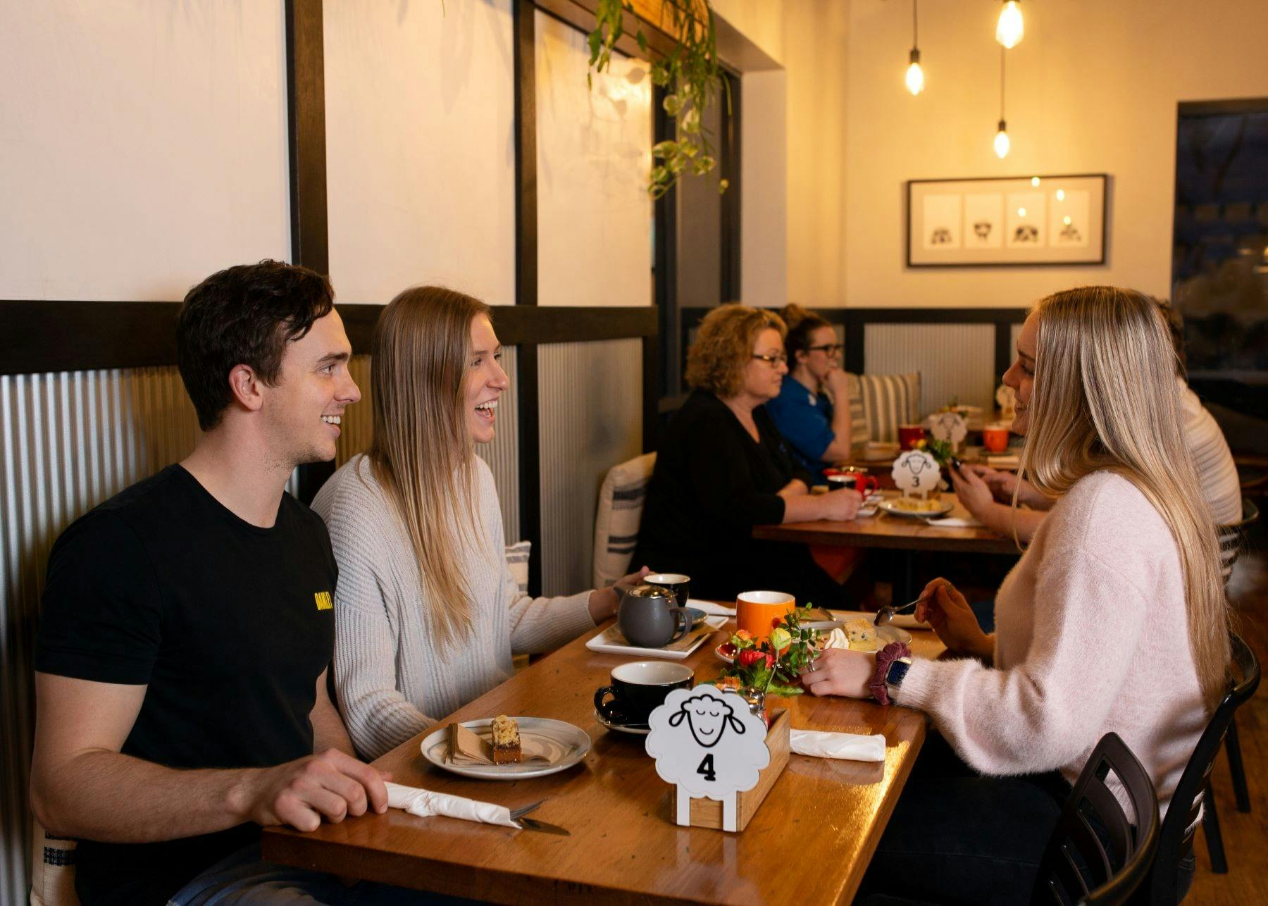 Group of people sitting in Cafe