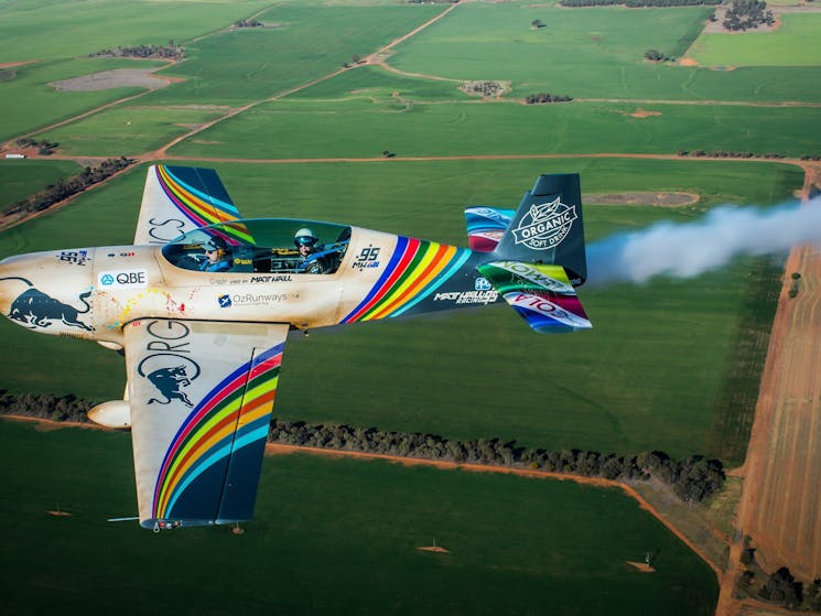 A passenger on their joy flight in the MHR Extra 300L