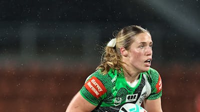 Canberra Raiders NRLW player Sophie Holyman running the ball.