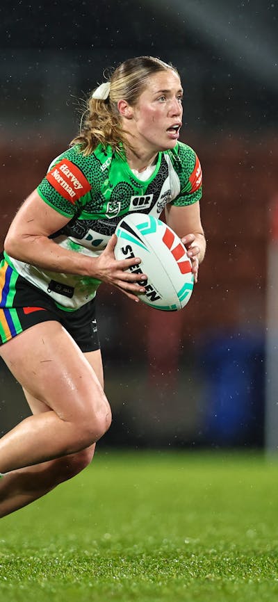 Canberra Raiders NRLW player Sophie Holyman running the ball.
