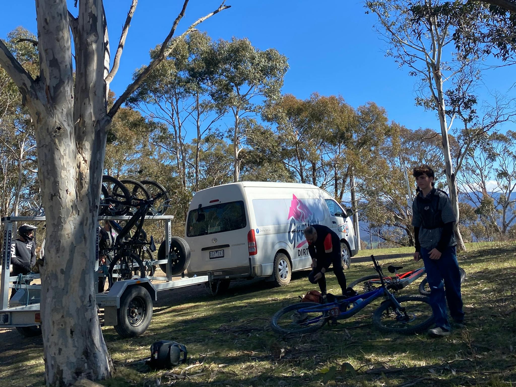 Gravity Dirt Co. shuttle dropping mountain bikers at the Sam Hill trailhead