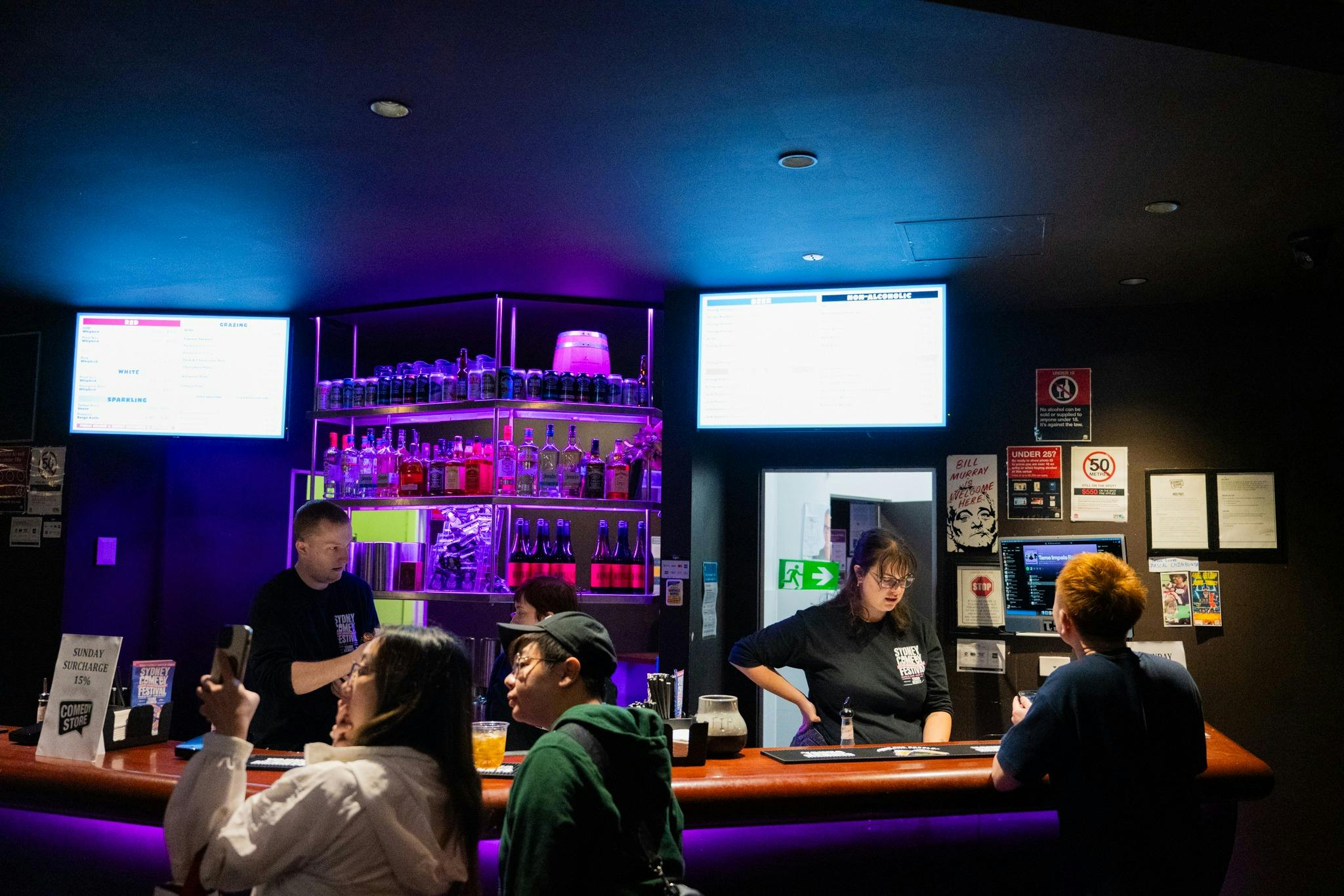 Bar and lounge area at The Comedy Store prepared for guests before a show.