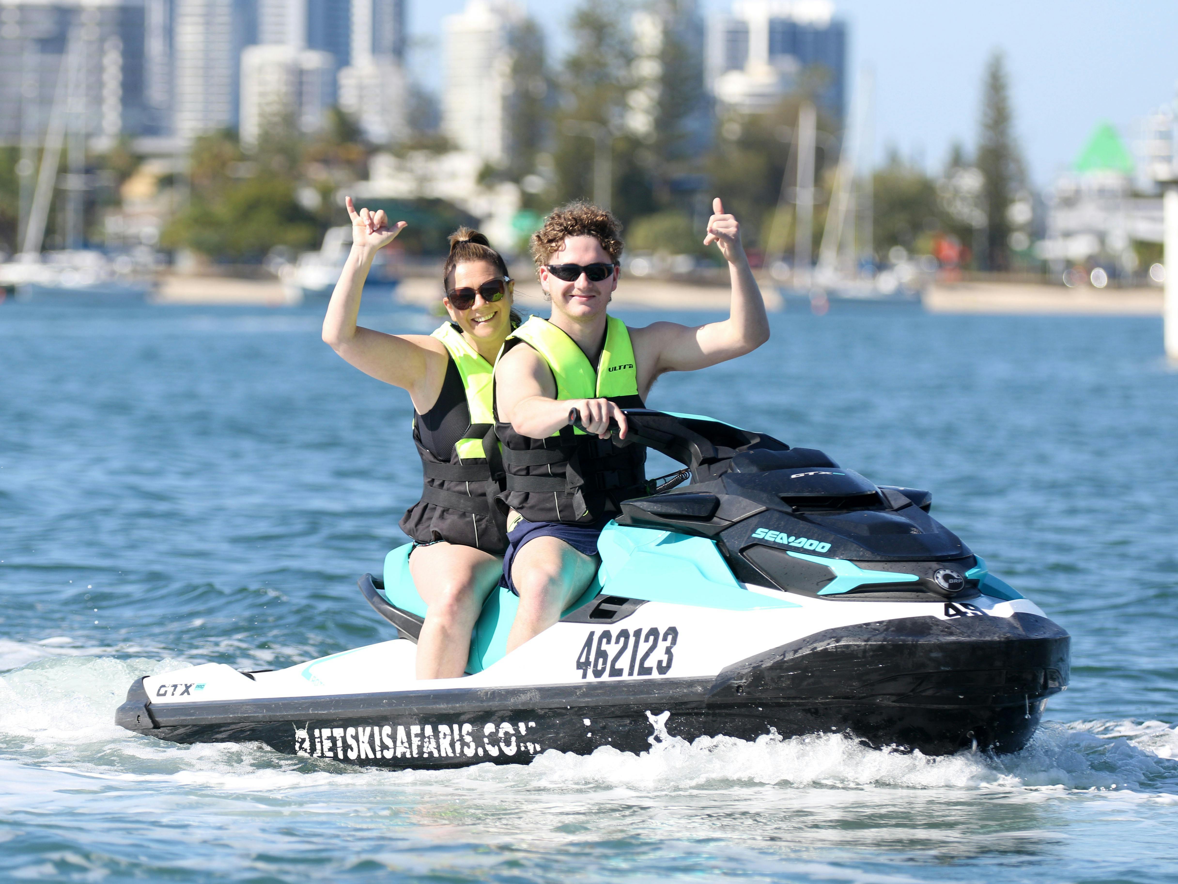 Couple having fun before their jet ski tour