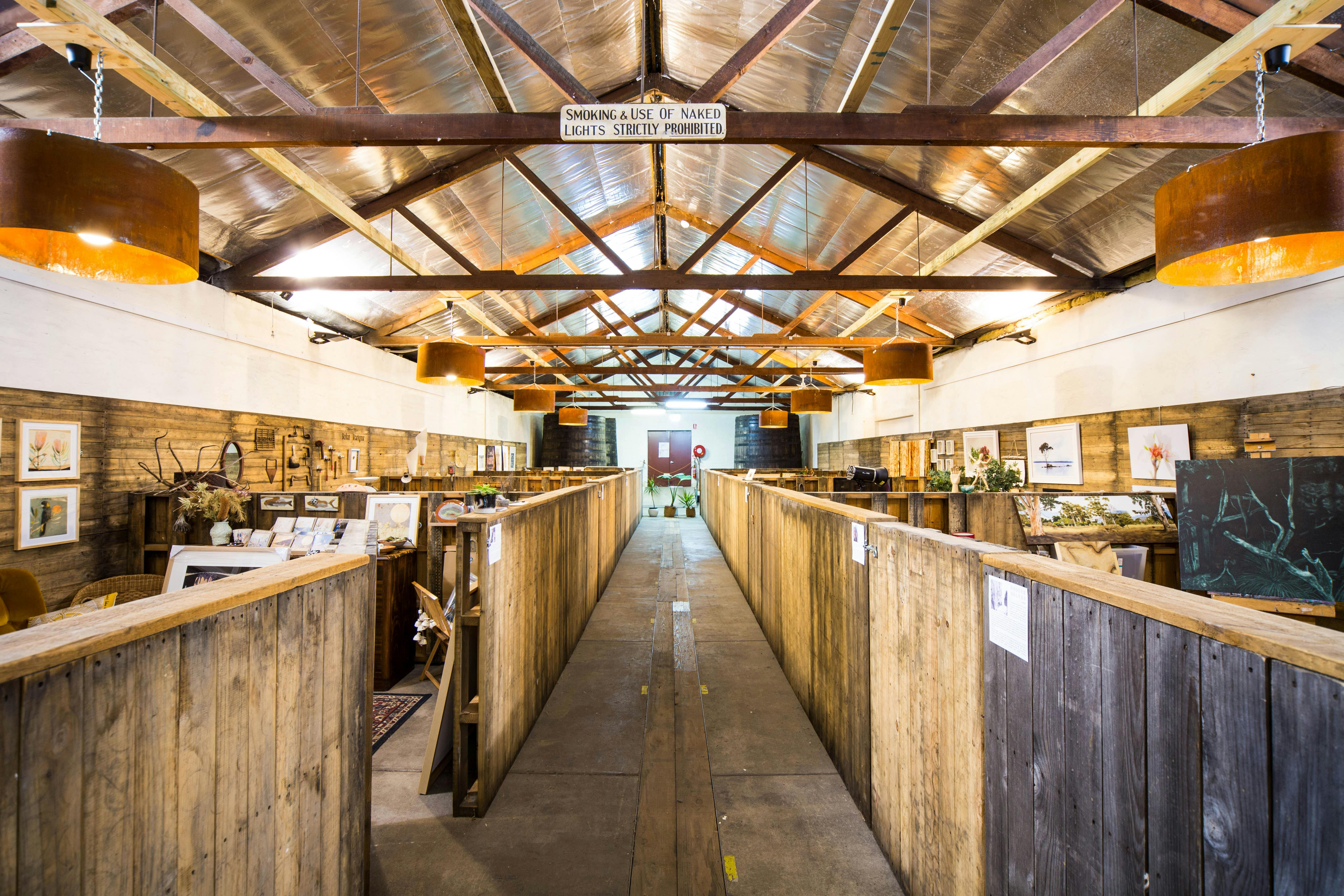 a photo of art studios made from wooden pallets