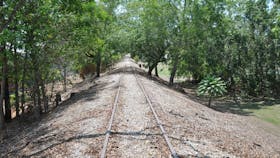 Remnant of railway track and mound.