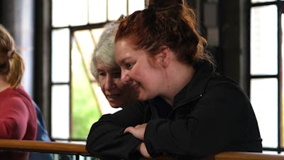 Visitors watching glass blowing