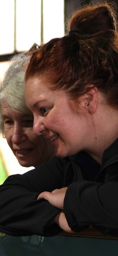Visitors watching glass blowing