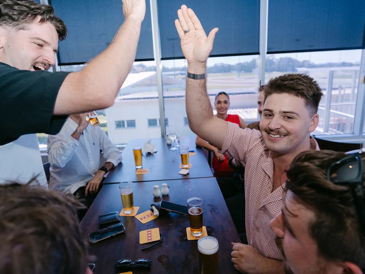 two friends going in to give each other a high-five