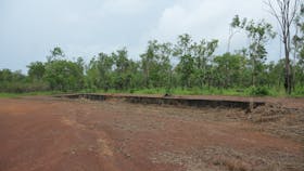 Raised railway siding and earth embankment at the end of the rail spur line