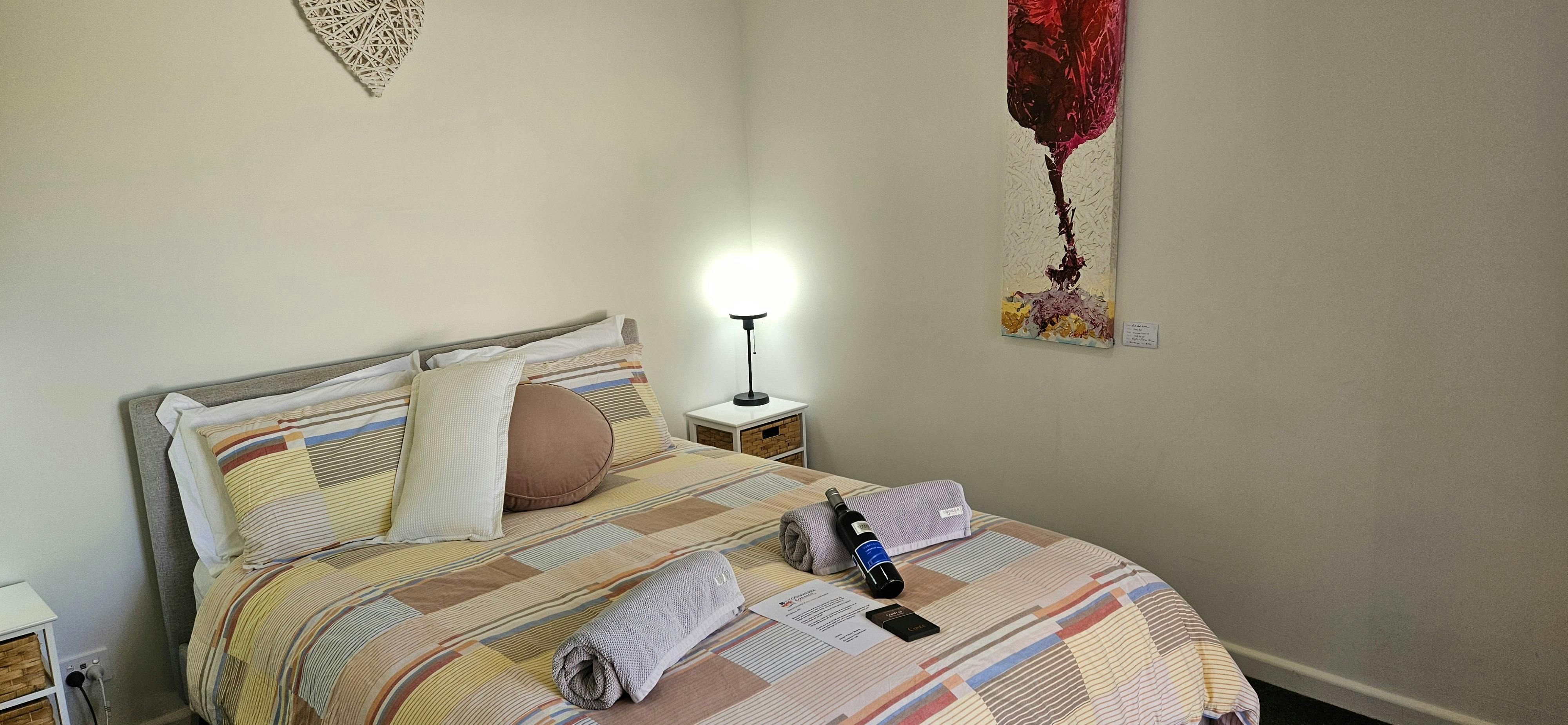 Queen bedroom inside Coonawarra apartment accommodation Penola