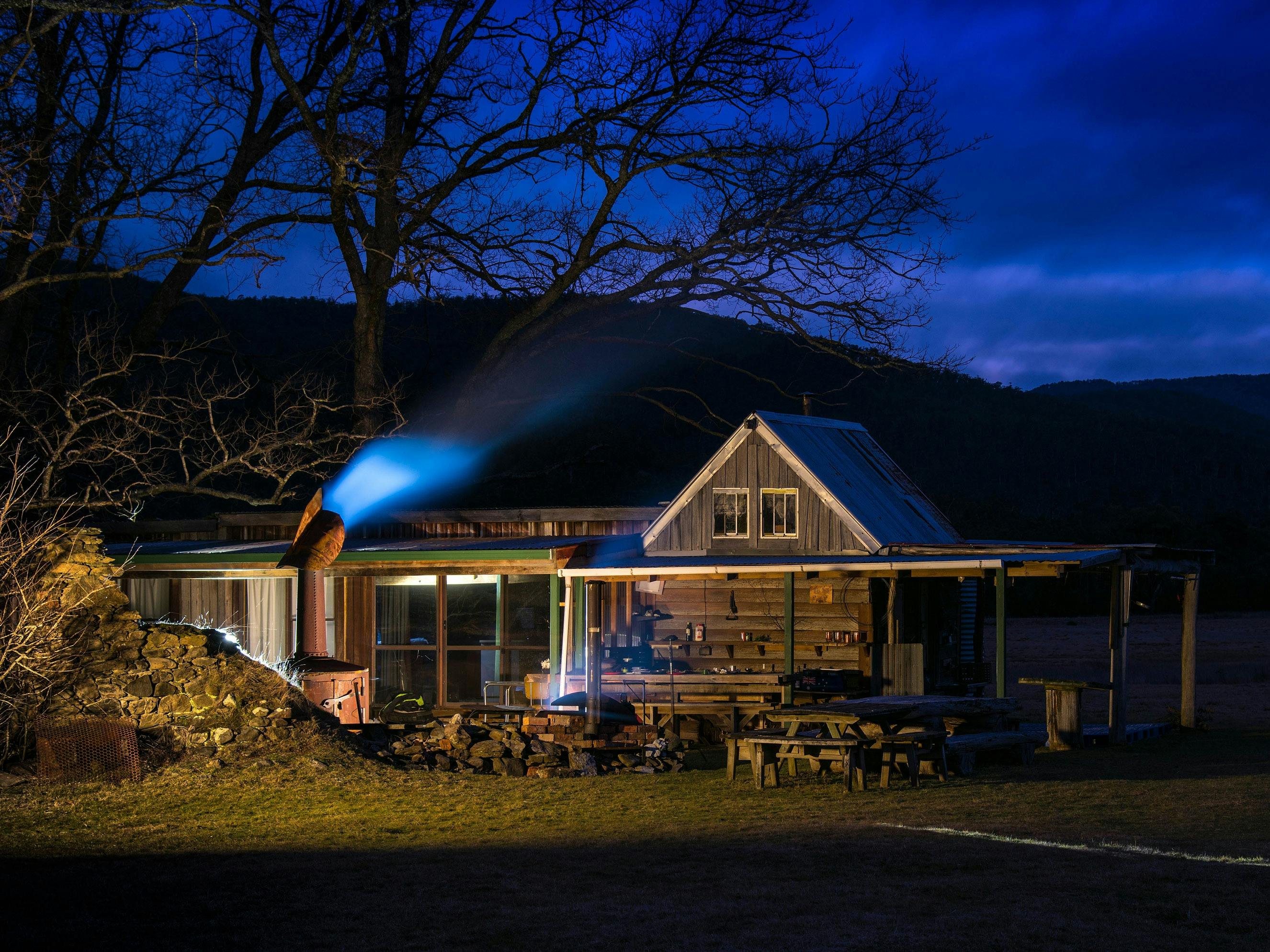 cabin and campfire after-dark
