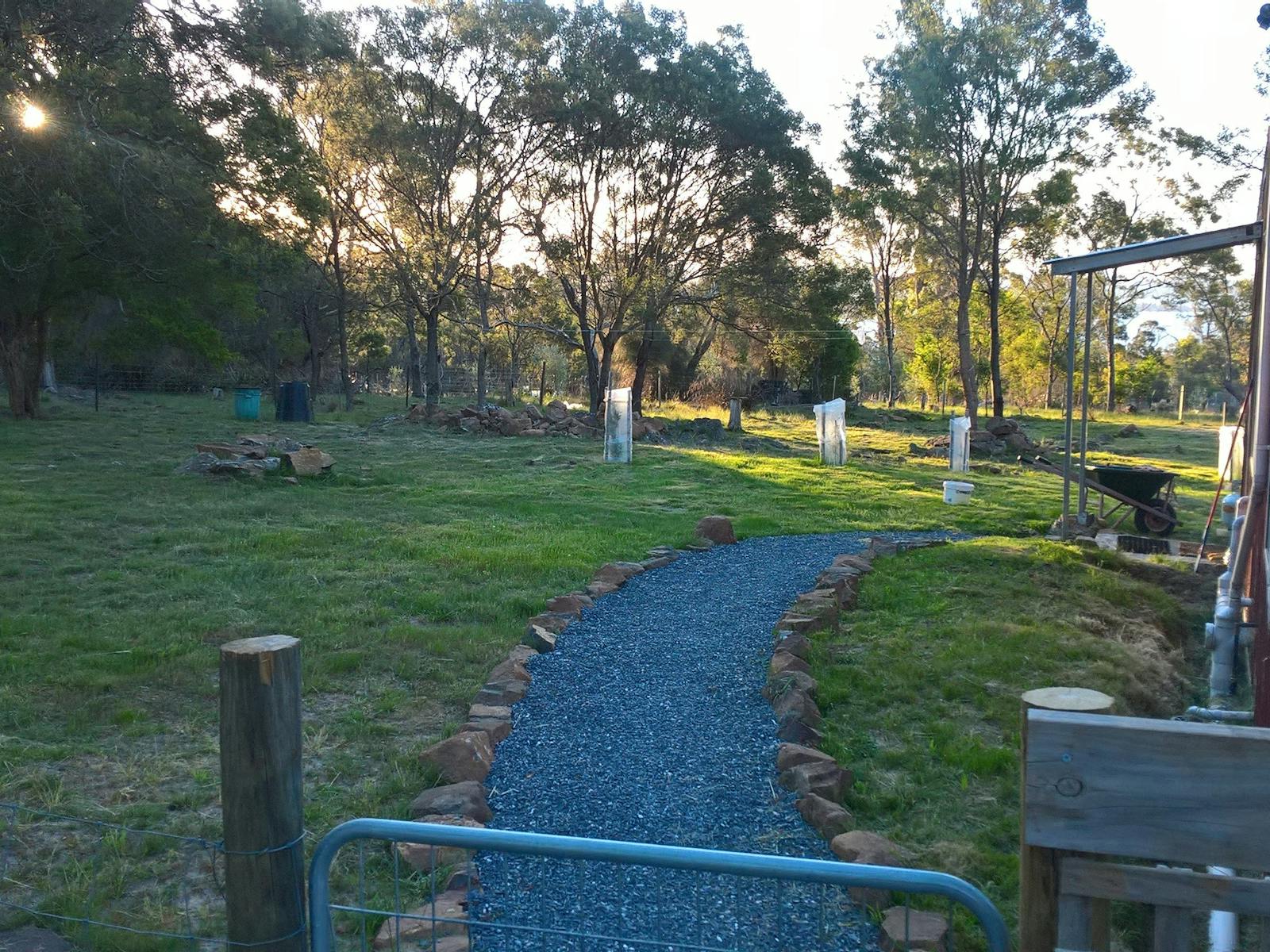 Entrance by carport with solar light and motion sensitive lights.