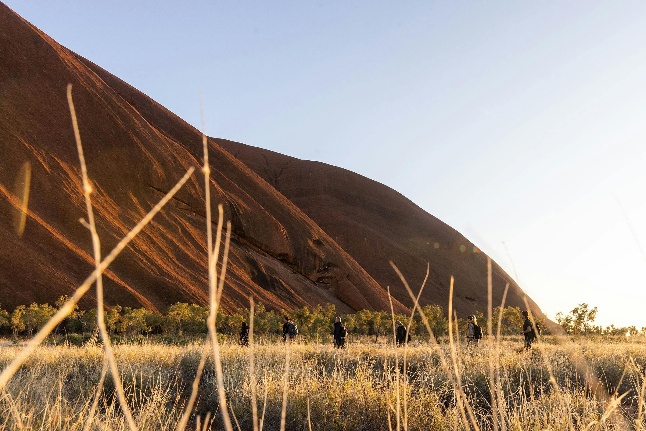 Walking around  Uluṟu with expert guides