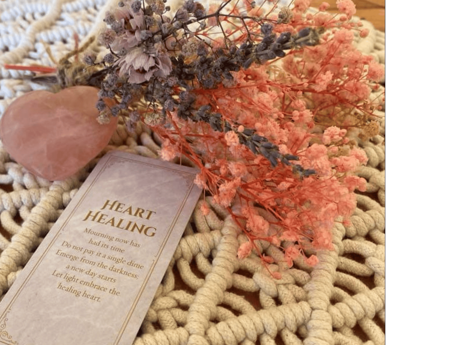 Dried flowers with tarot card and heart crystal Dried flowers with tarot card and heart crystal