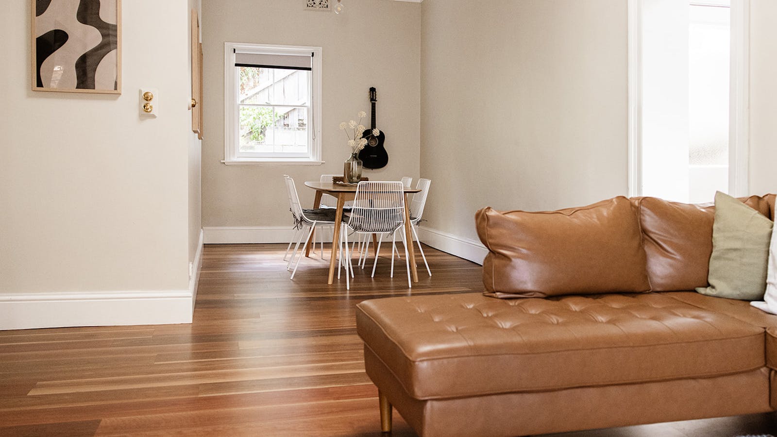A spacious open dining and lounge area overlooking the courtyard.