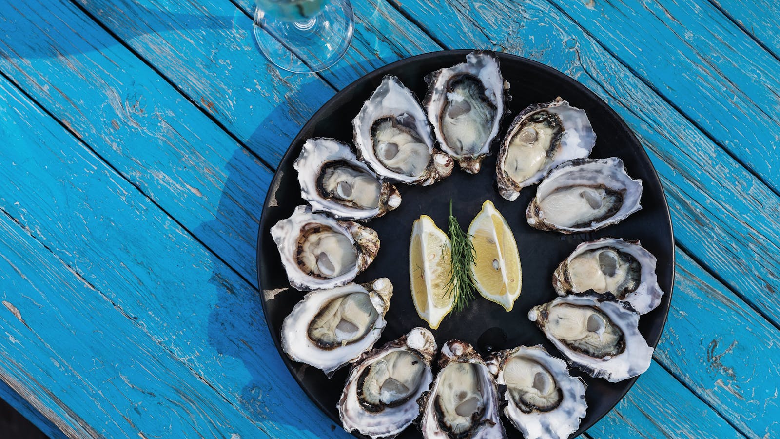 Feast on fresh Tasmanian produce like these Bruny Island Oysters with Adventure Trails Tasmania