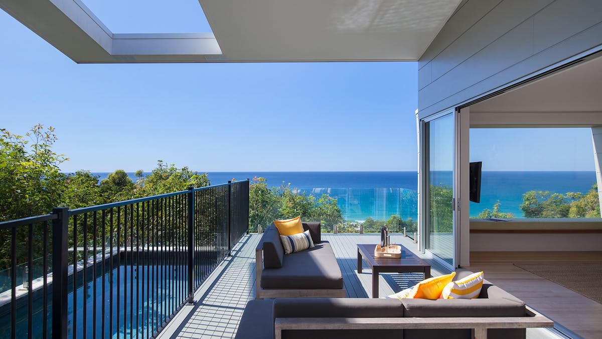 Elevated balcony with ocean views, lap pool and BBQ