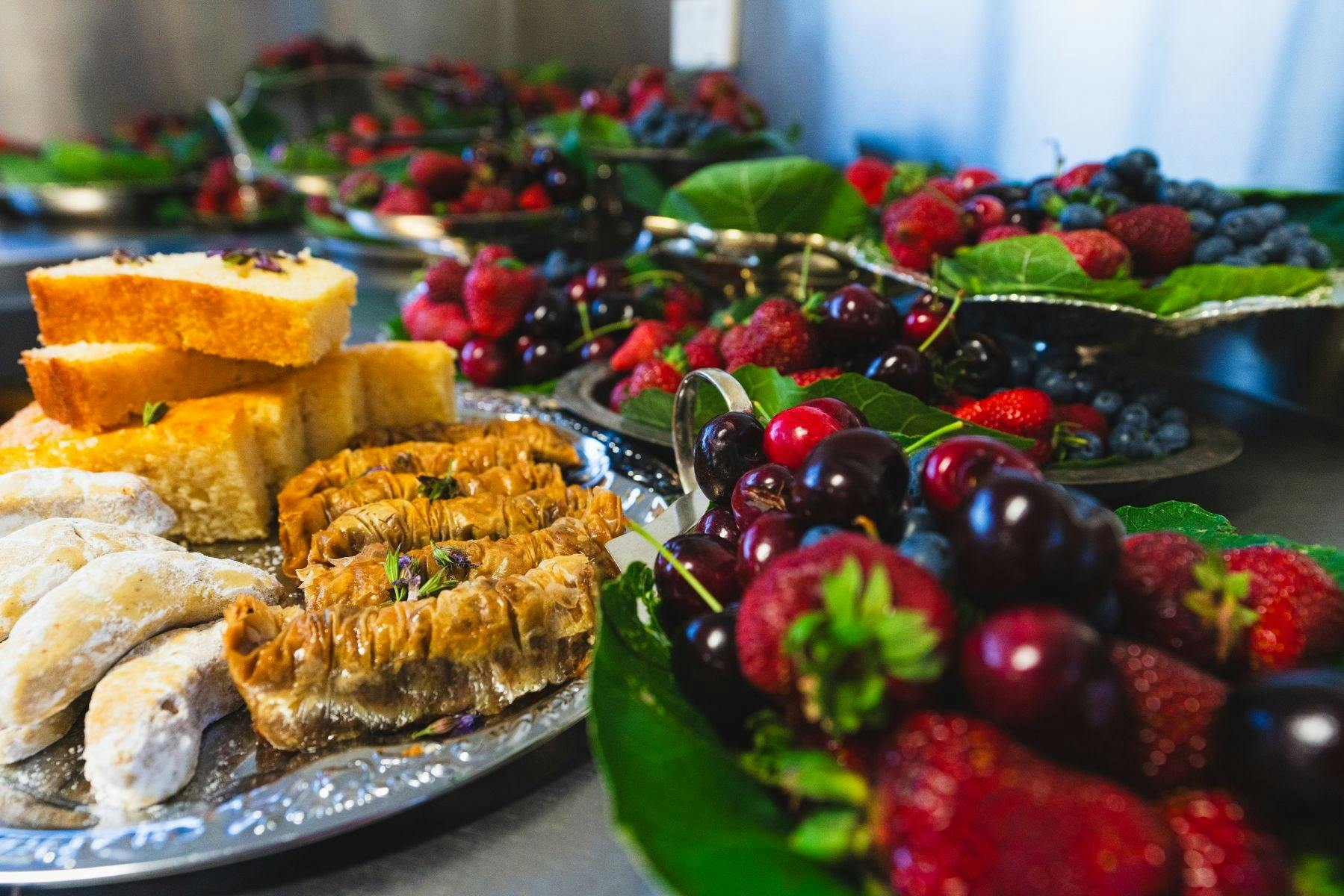 Platters of fruit and savoury snacks