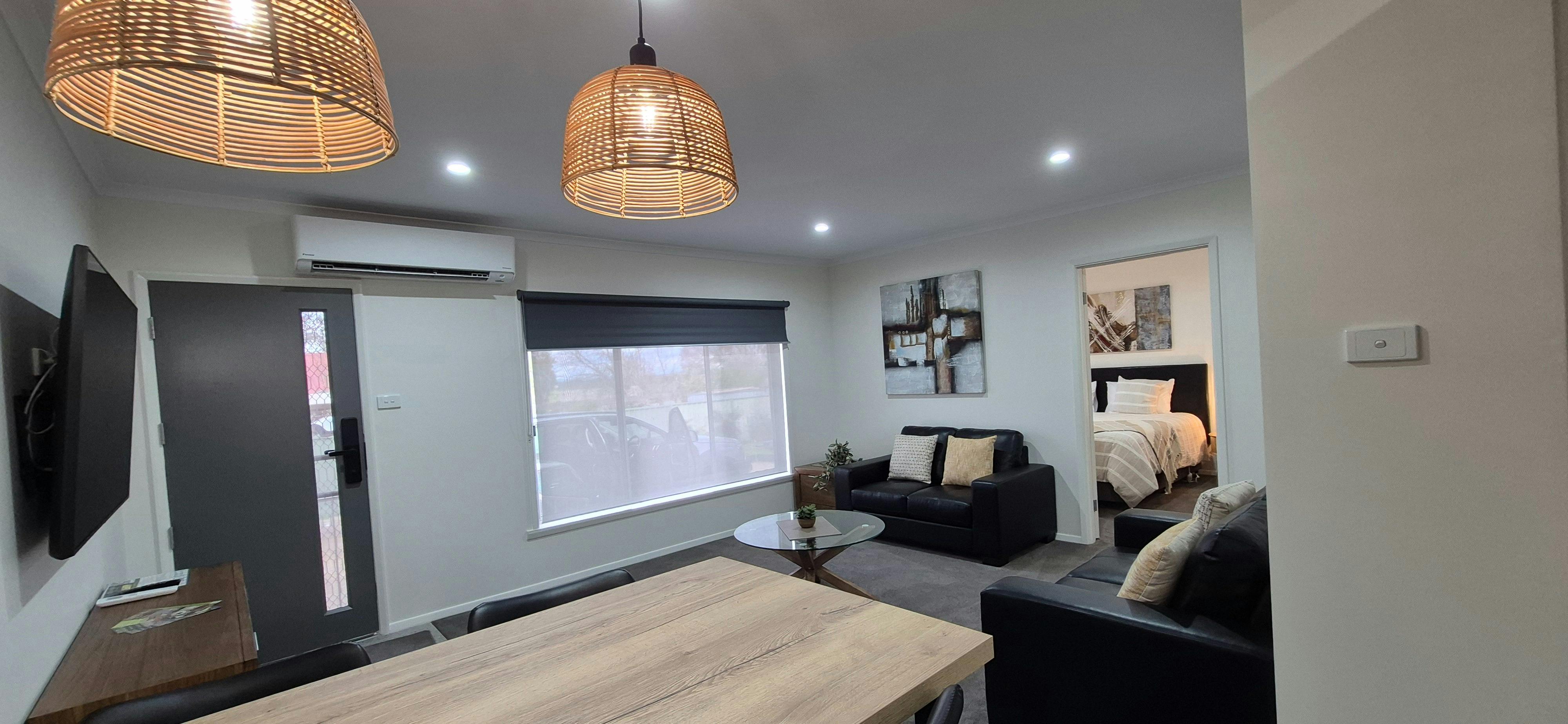 2 x 2 seater sofa, split system air conditioner, block out blinds