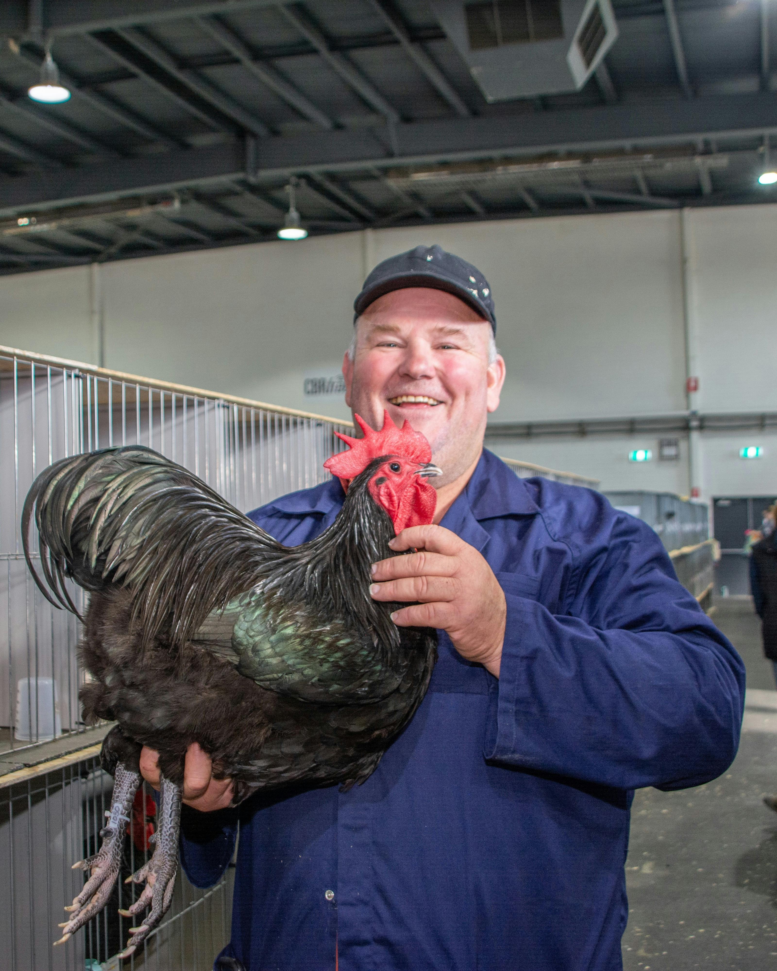 exhibitor with his chicken