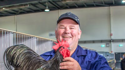 exhibitor with his chicken