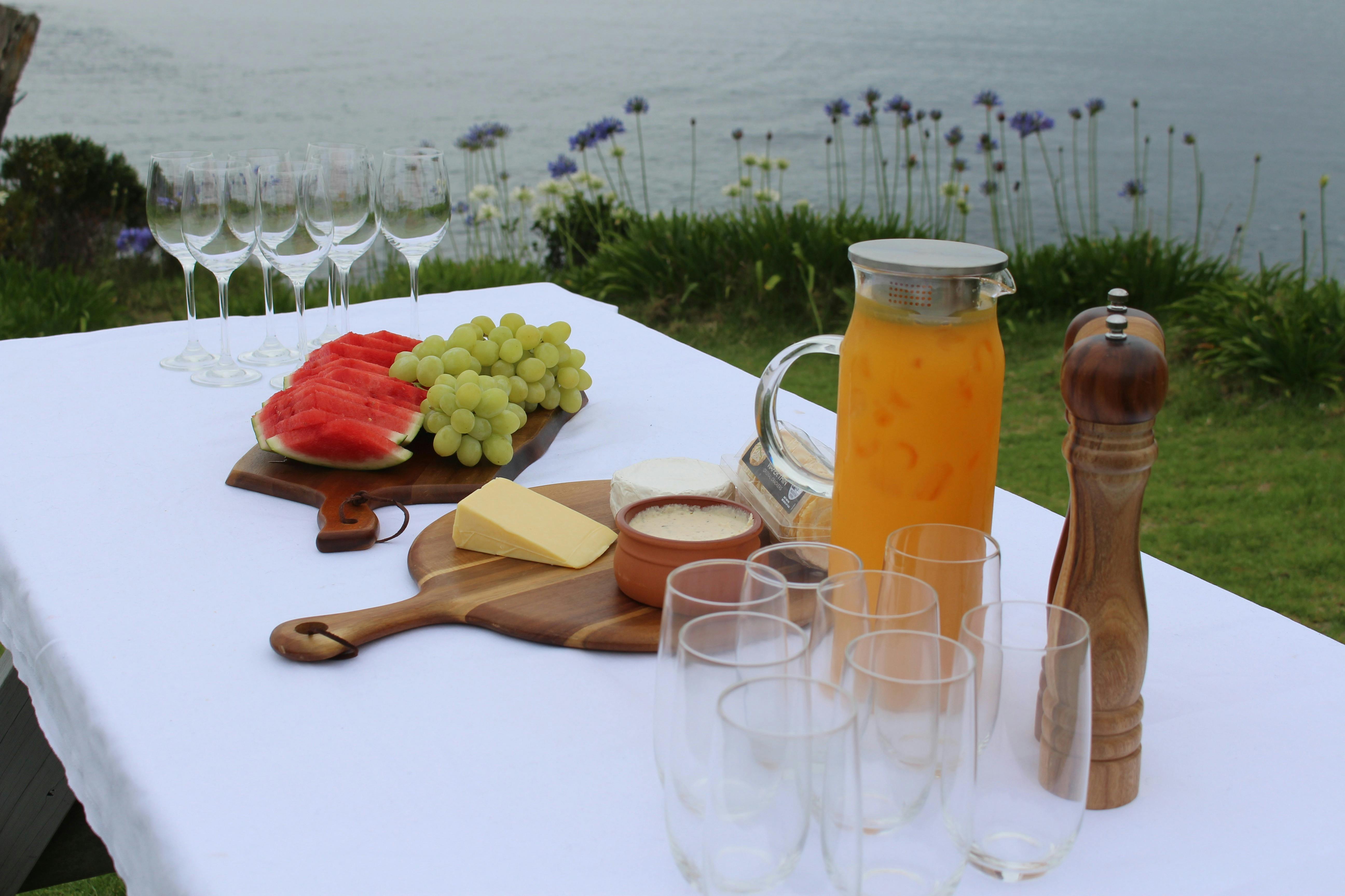Local produce presented nicely on a table overlooking the ocean