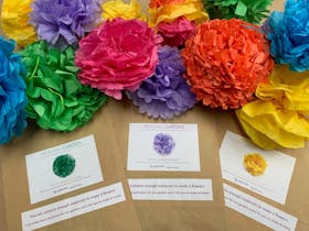 Paper bags with colourful paper flowers