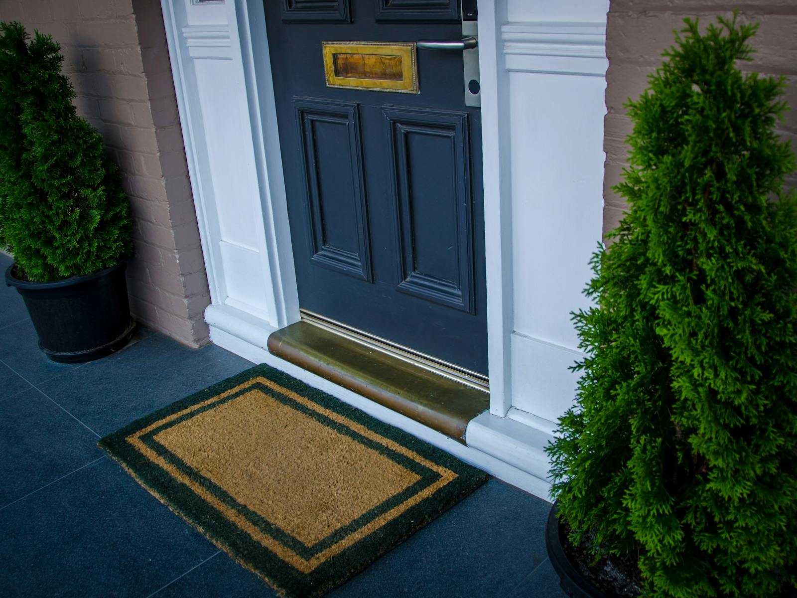 Apartment 1 Wellington front door and welcome mat