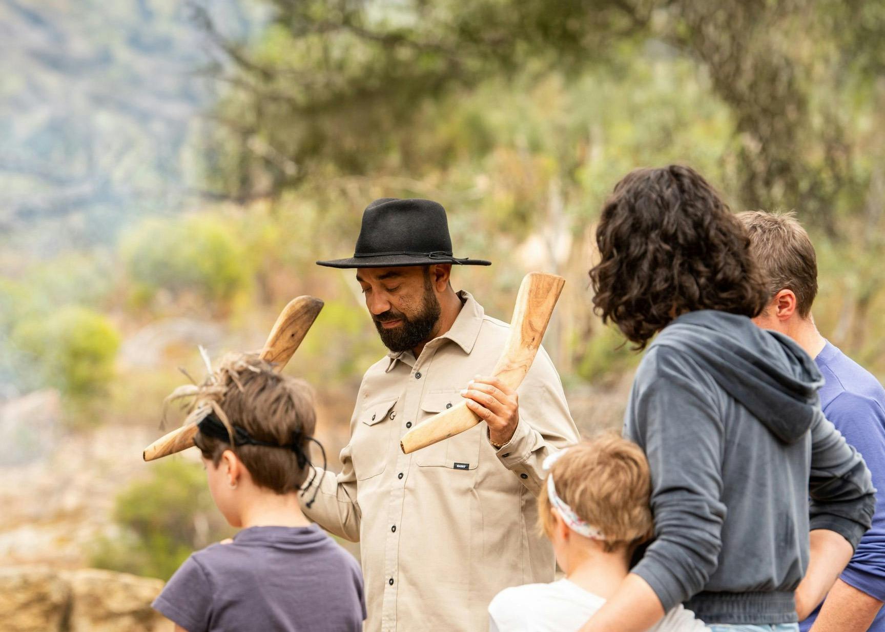 A Djaara man takes a family on a tour of Djaara Country