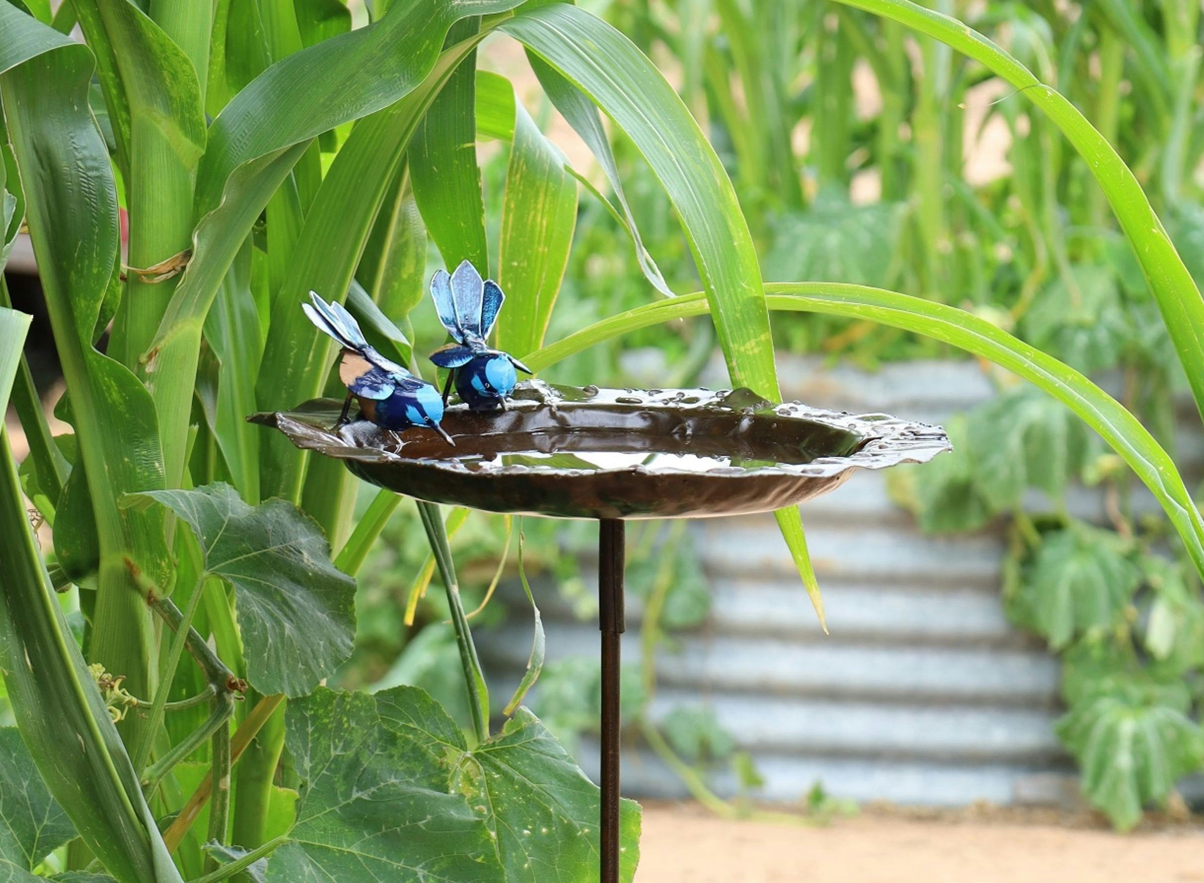 Bird feeder made from recycled metal