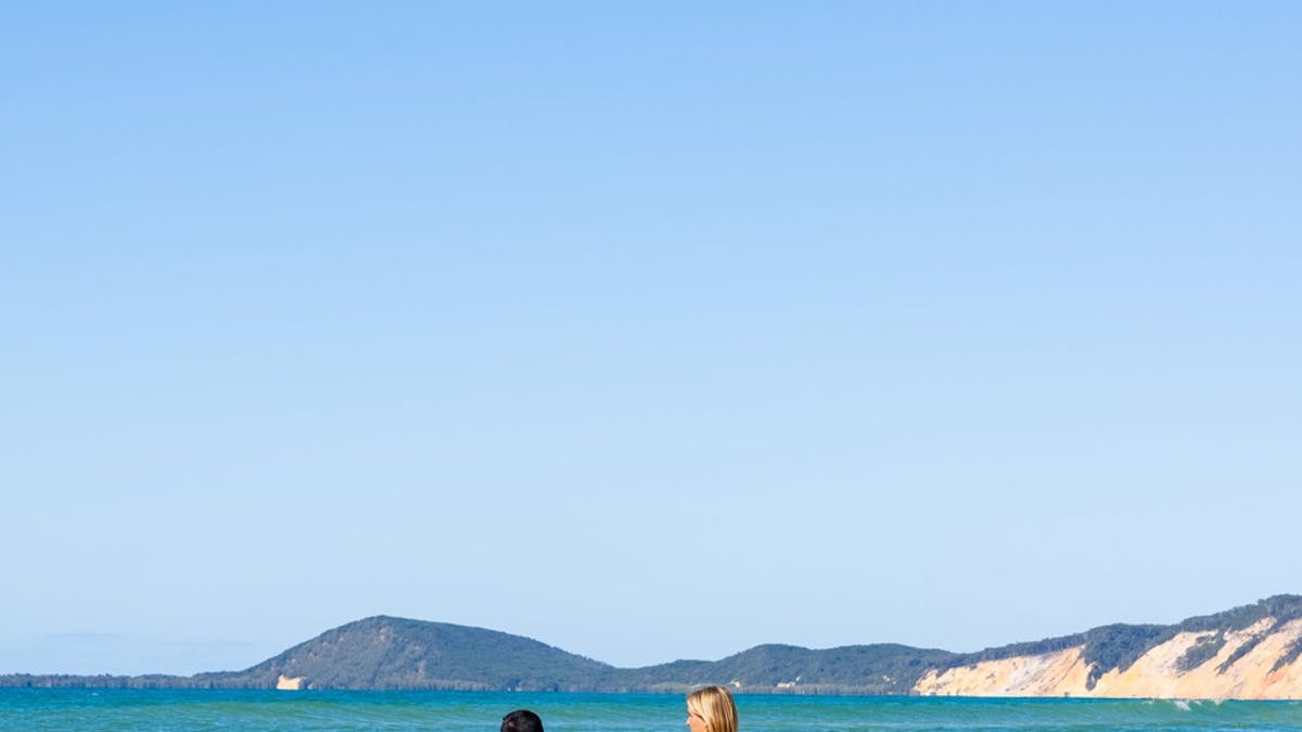 People swimming in the ocean at Carlo Sandblow