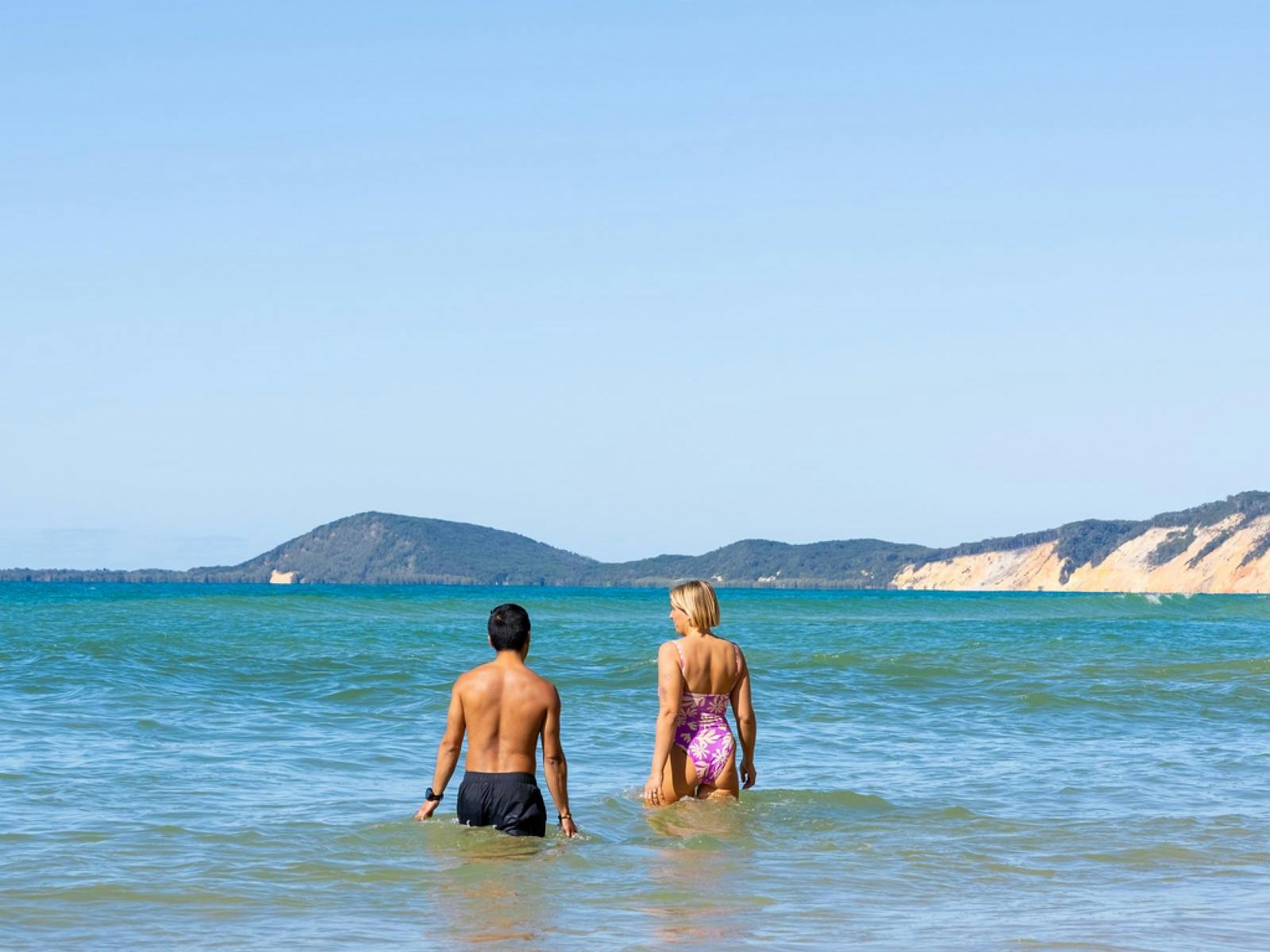 People swimming in the ocean at Carlo Sandblow