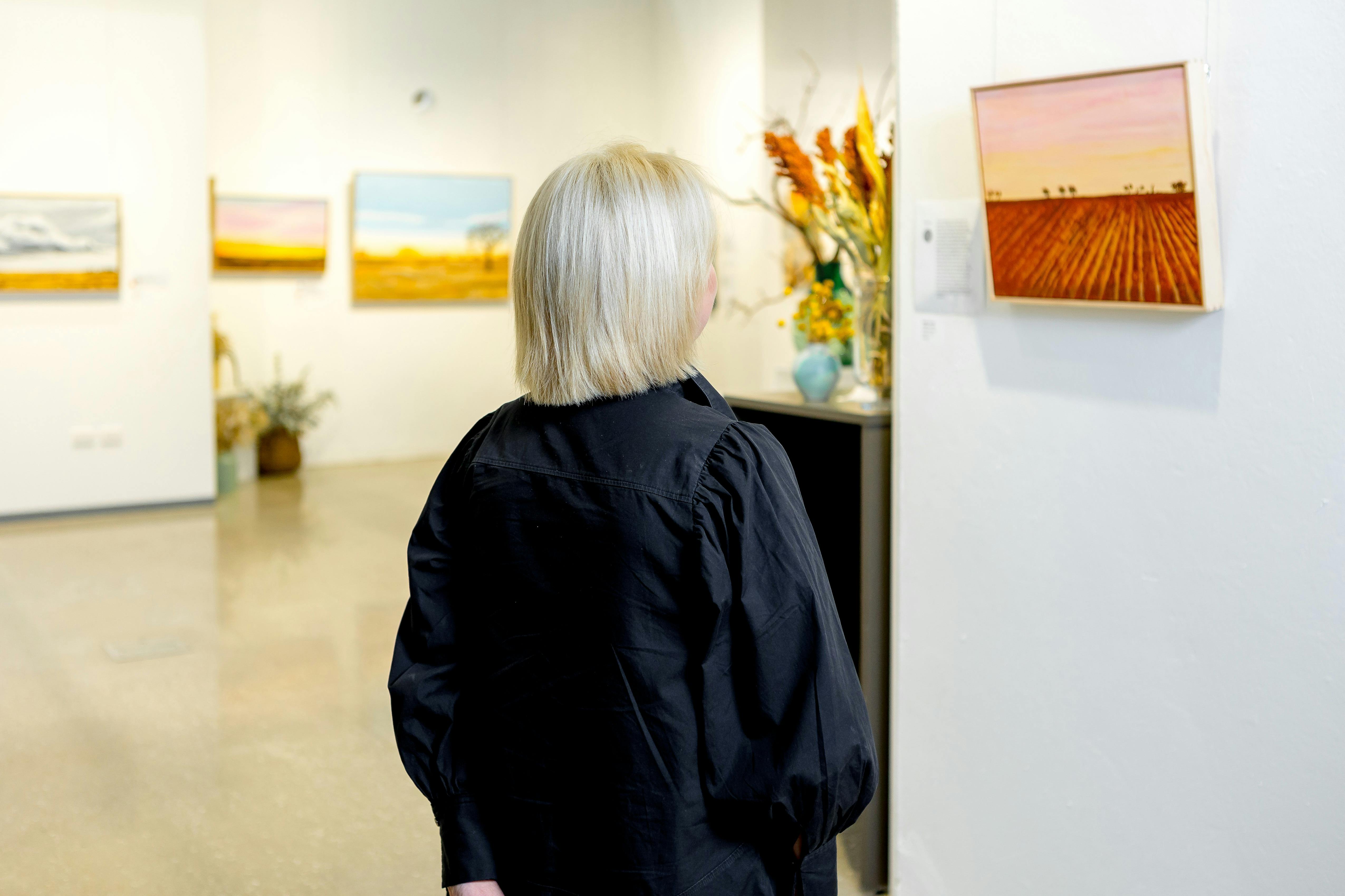 Person admiring artwork