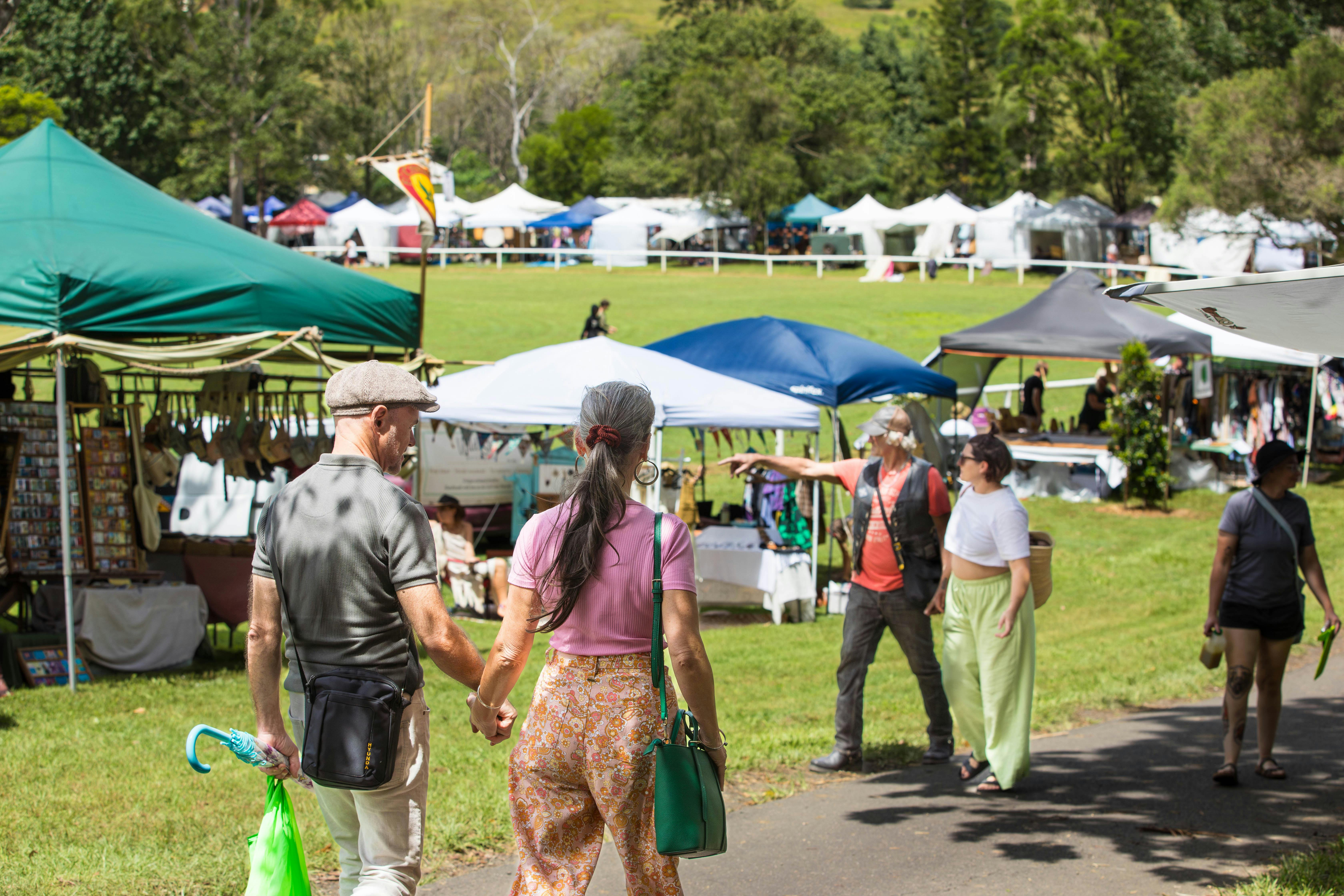 Couple strolling through the market stalls