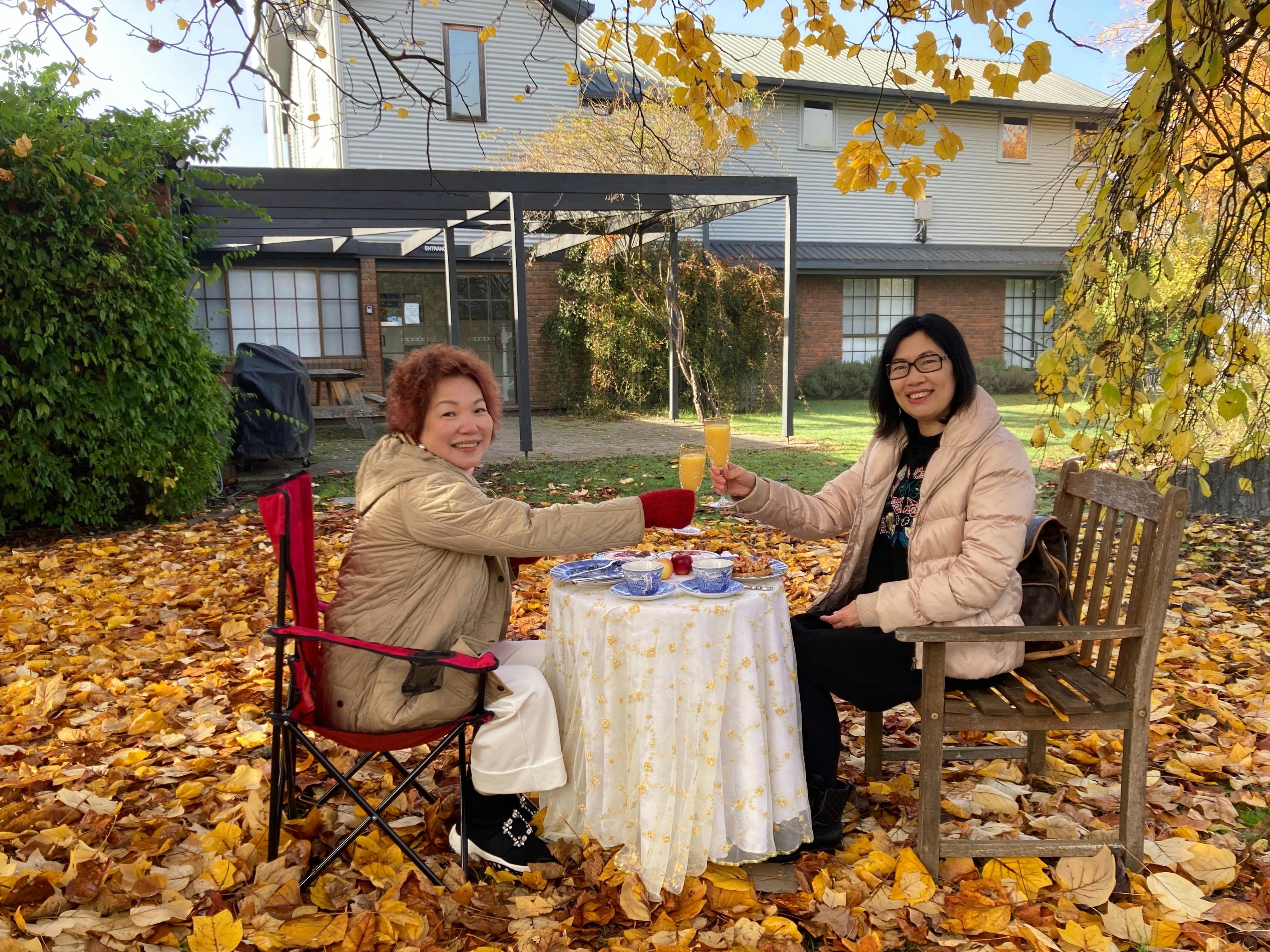 Guests breakfasting in garden