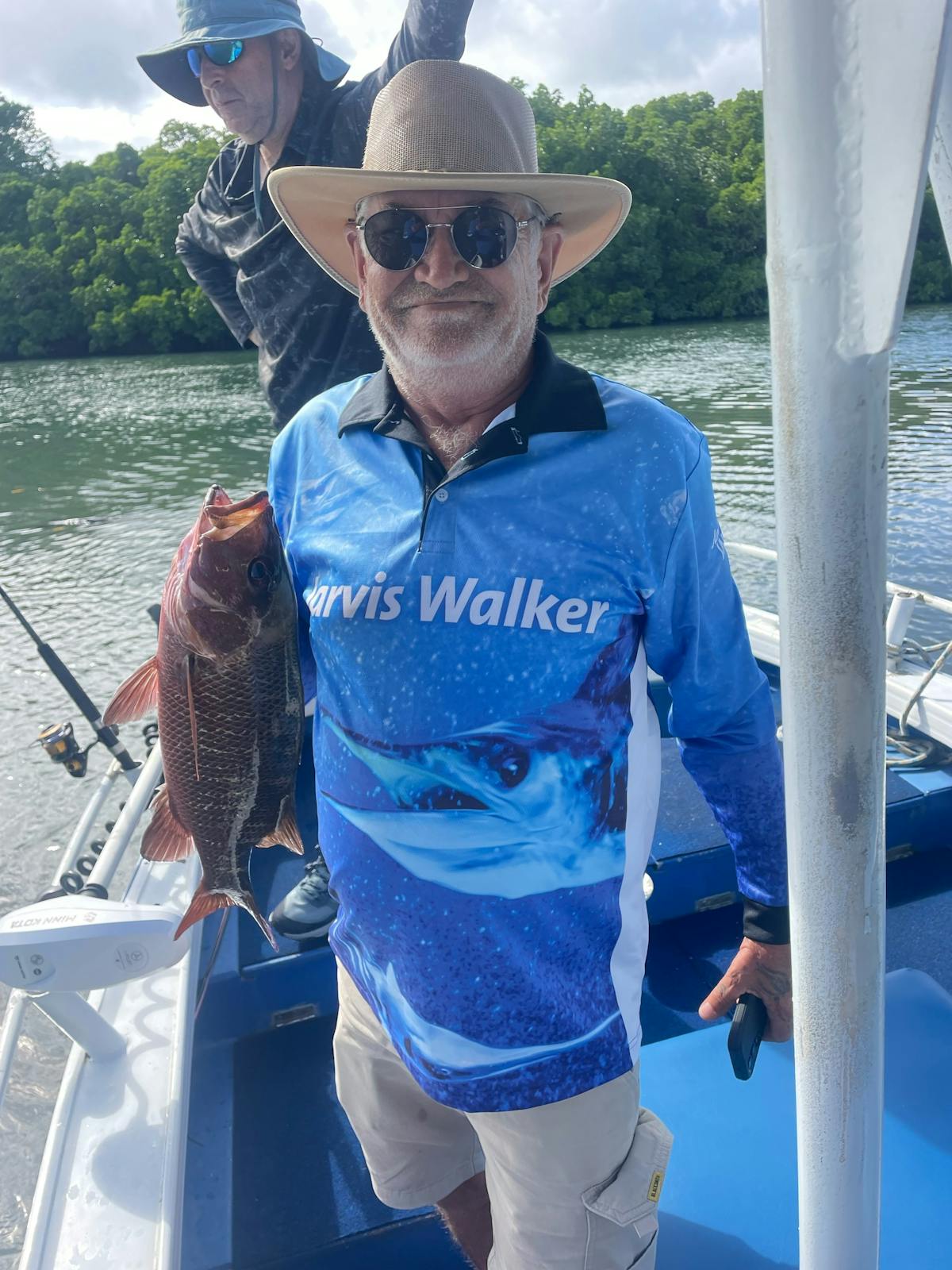 Live bait fishing in the estuary of Trinity Inlet for Mangrove jacks