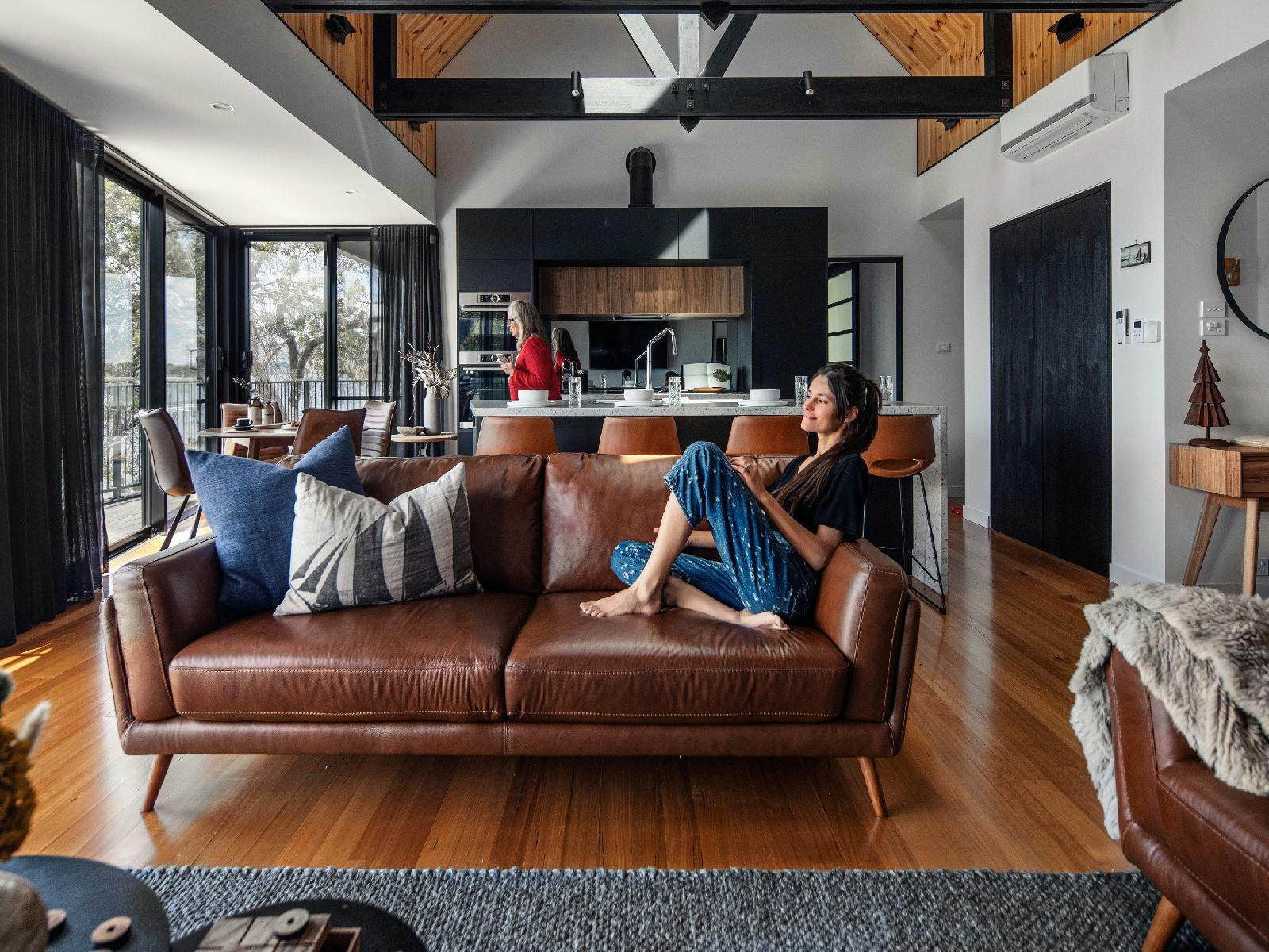 The open plan living area is perfect for relaxing or interacting with friends and families